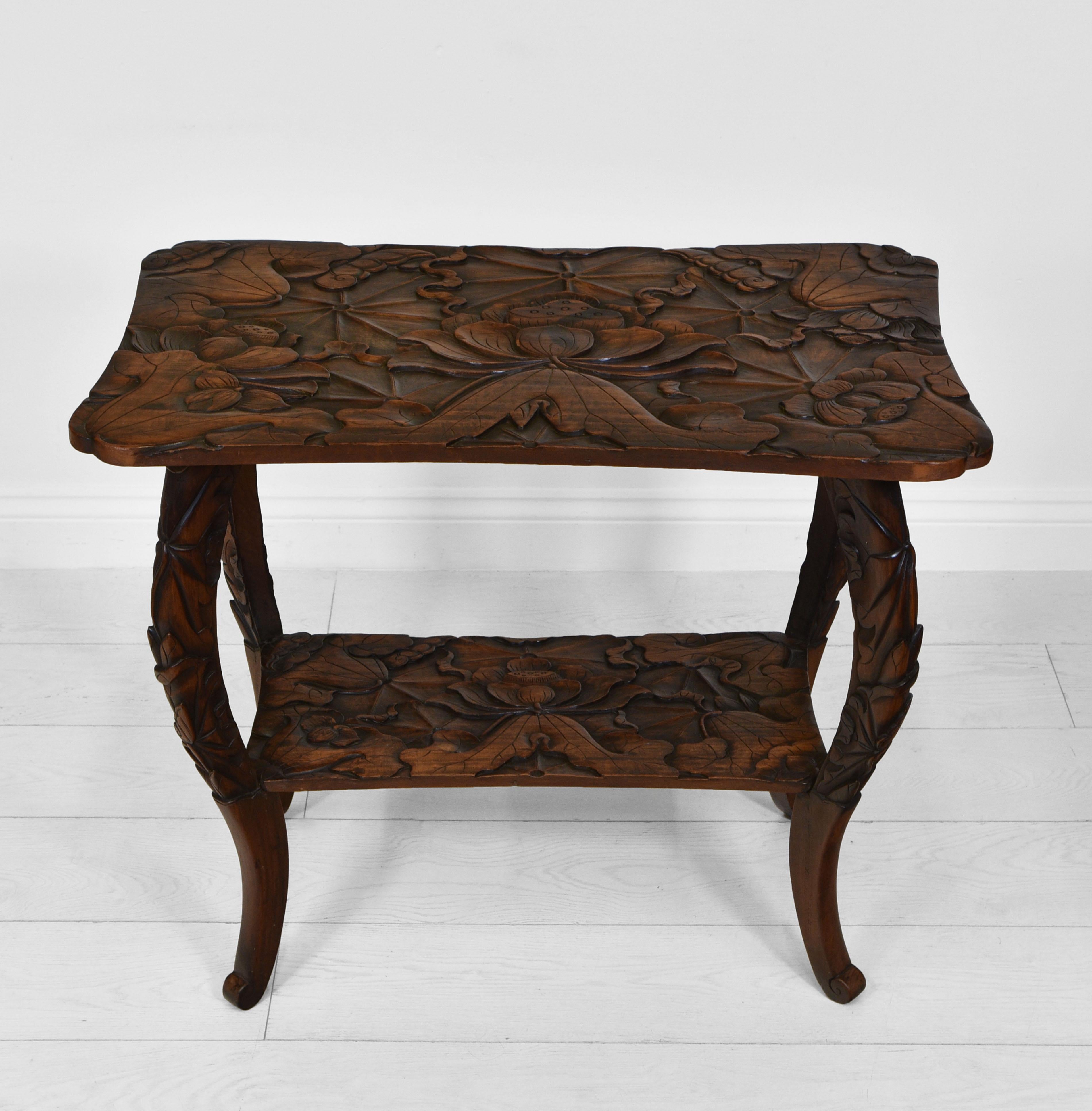 A Japanese fruitwood carved side table, retailed by Liberty & Co. Circa 1900.

These tables were commissioned by Liberty & Co, and hand-carved in Japan. The firm imported Middle Eastern and Oriental goods sympathetic to the ideals of the Art