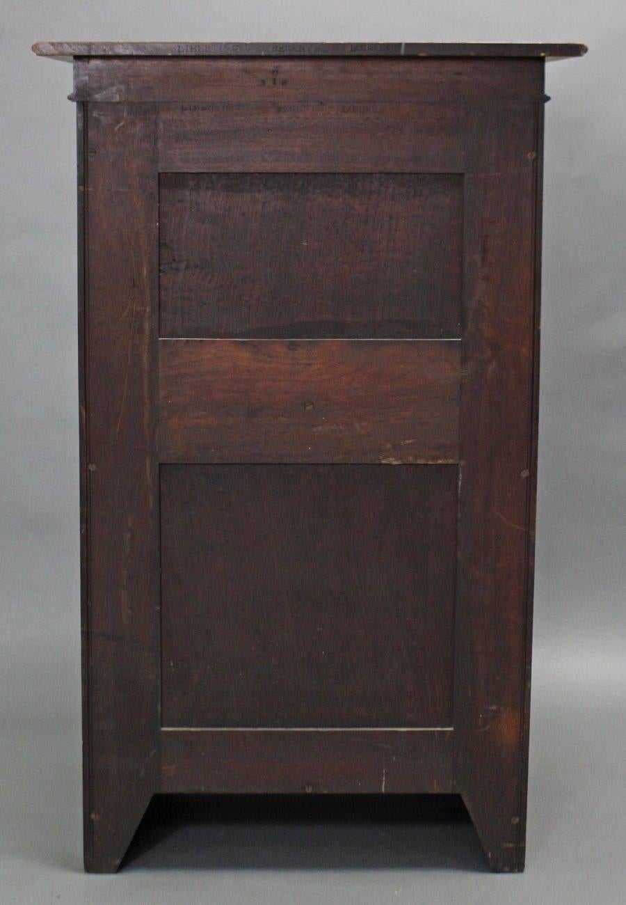 Hand-Crafted Liberty & Co Moorish Walnut Music Cabinet with Bottle Neck Glass Up & Over Door For Sale