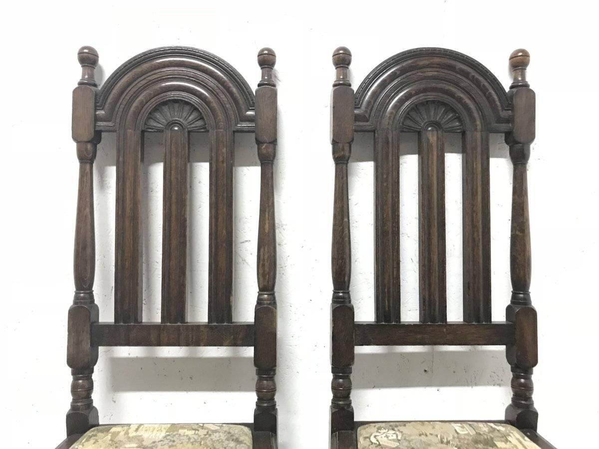 Hand-Carved Liberty & Co. Set of 14 Gothic Style Arts & Crafts Oak Dining Chairs & Armchairs