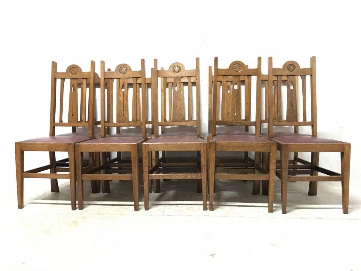 Arts and Crafts Liberty & Co, Ten Arts & Crafts Oak Dining Chairs with Stylised Floral Details