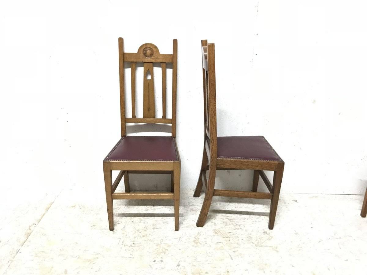 Hand-Crafted Liberty & Co, Ten Arts & Crafts Oak Dining Chairs with Stylised Floral Details