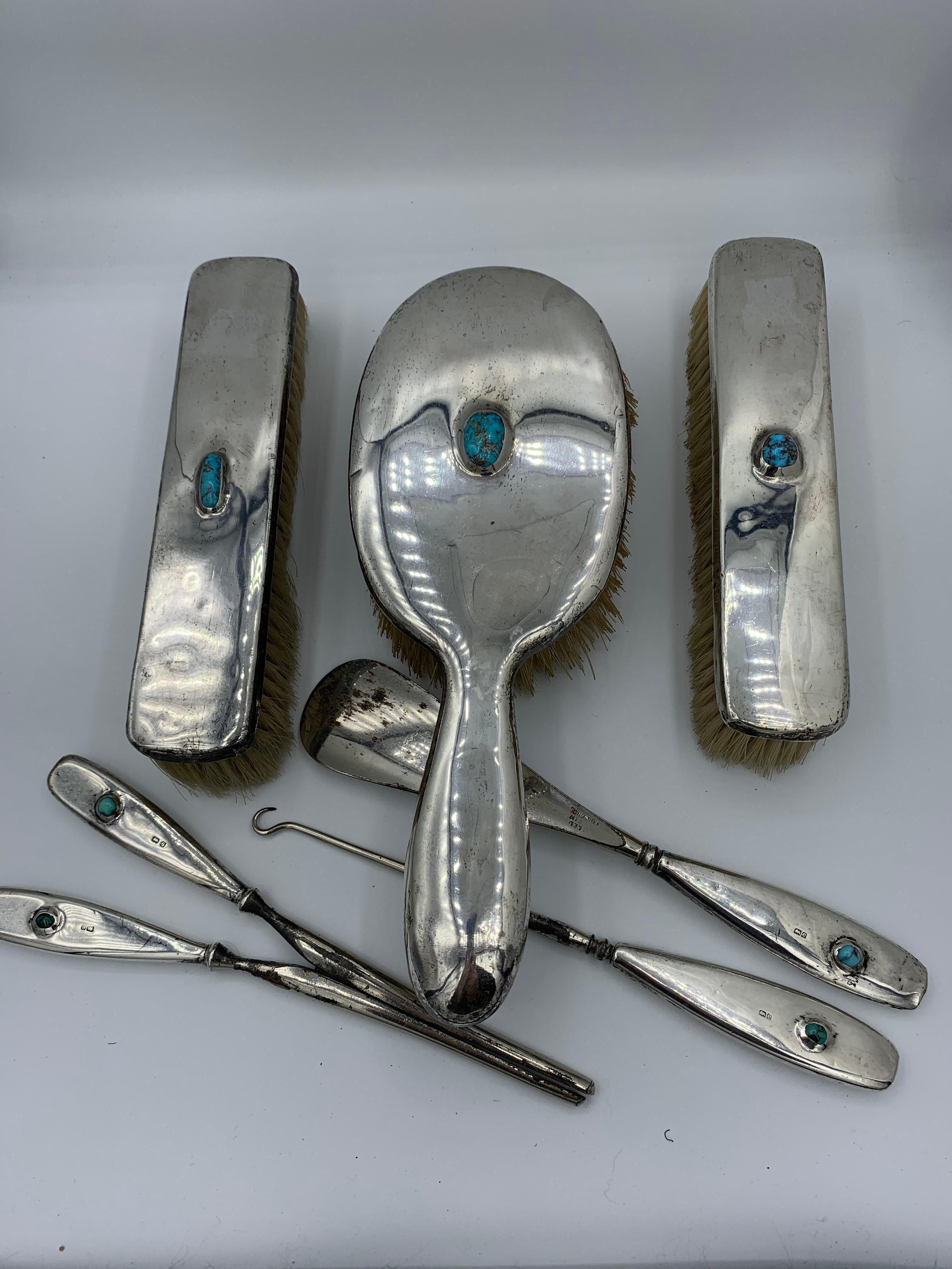 Liberty & Co Turquoise Cymric Pattern Six Piece Dresser Set 1903 Sterling Silver In Good Condition For Sale In New York, NY