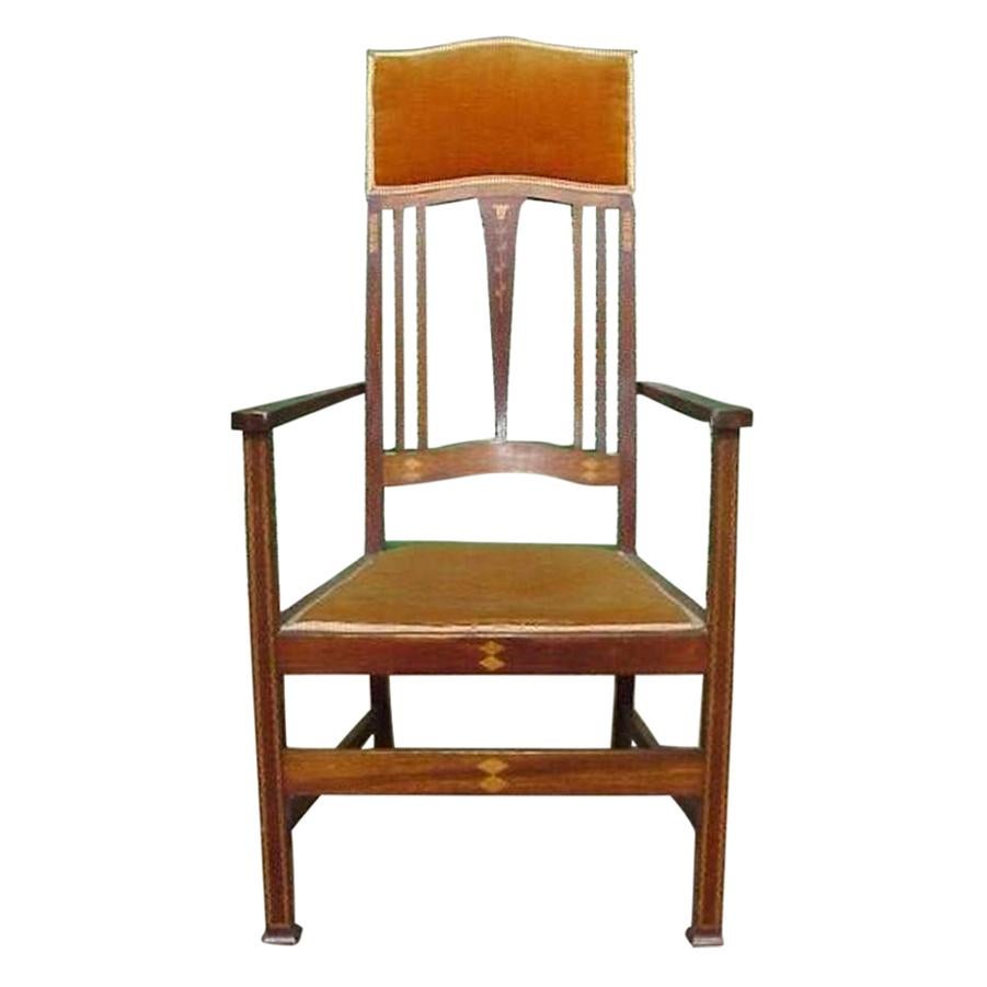Liberty and Co. Two Arts and Crafts Mahogany Armchair's with Stylized