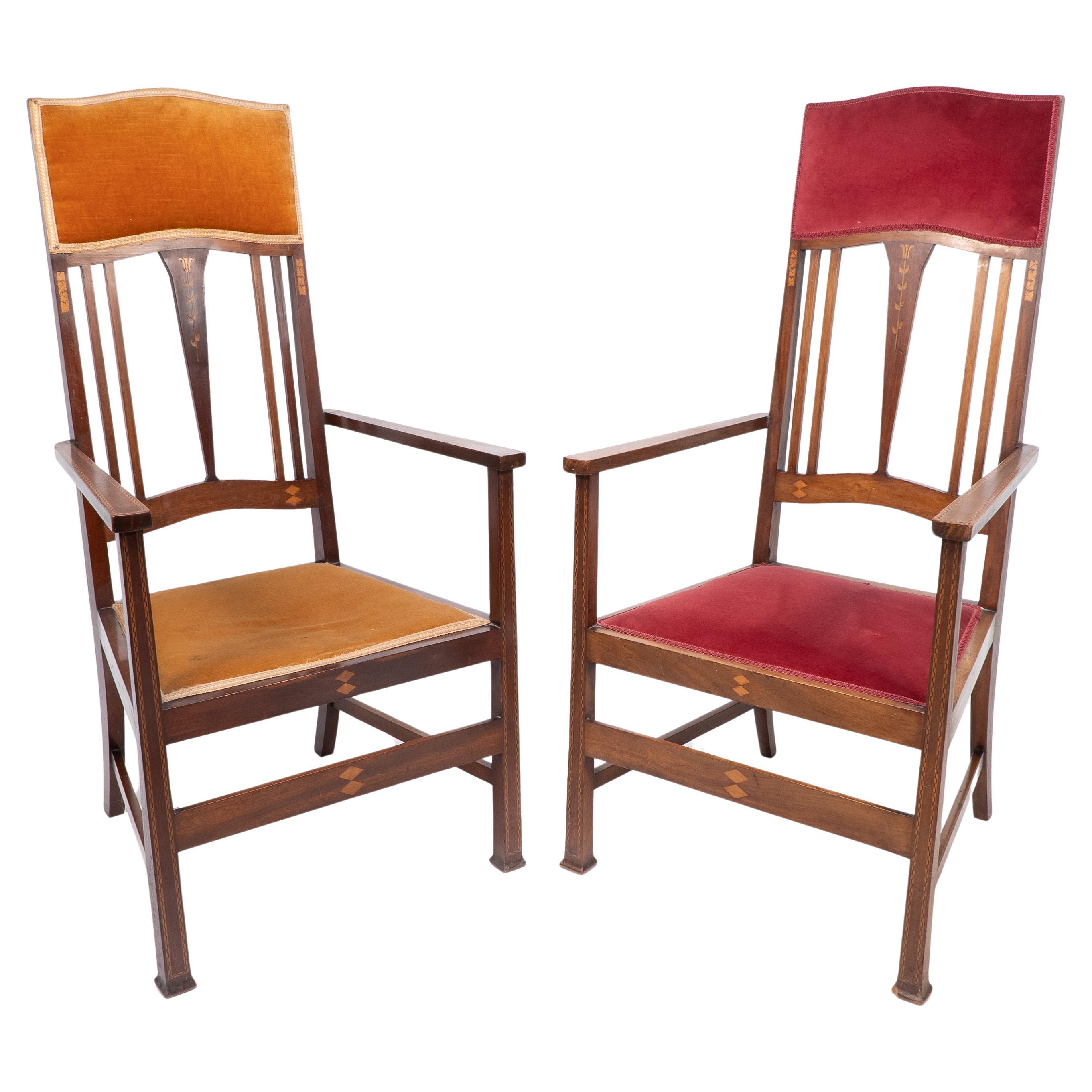 Liberty & Co. Two Arts & Crafts mahogany armchairs with stylized floral inlays For Sale