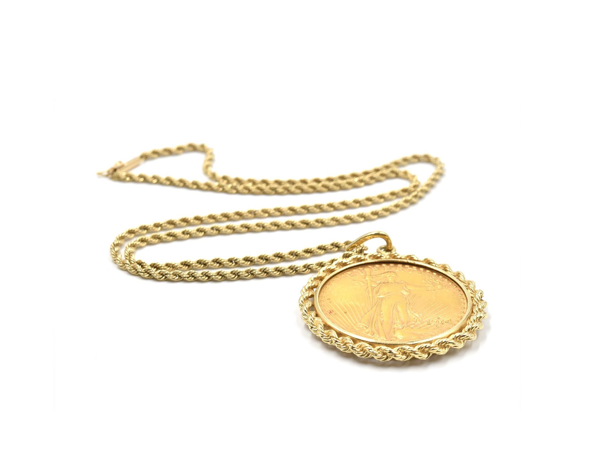 Designer: custom design
Material: 14k yellow gold
Dimensions: pendant measures 2-inch long from bail and 1 3/4-inch in diameter, necklace is 20-inch long and 1/8-inch wide, necklace with pendant measures 22-inch long
Weight: 52.94 grams

