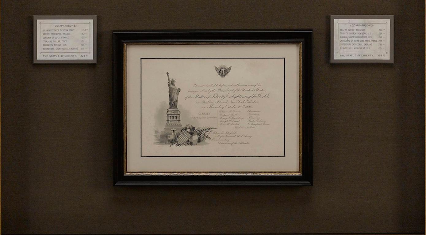 This collage features an 1883 engraving of the soon-to-be completed Statue of Liberty and her pedestal. Underneath the engraving sits an original invitation to the inauguration of the statue, dated October 28, 1886. On either side are published