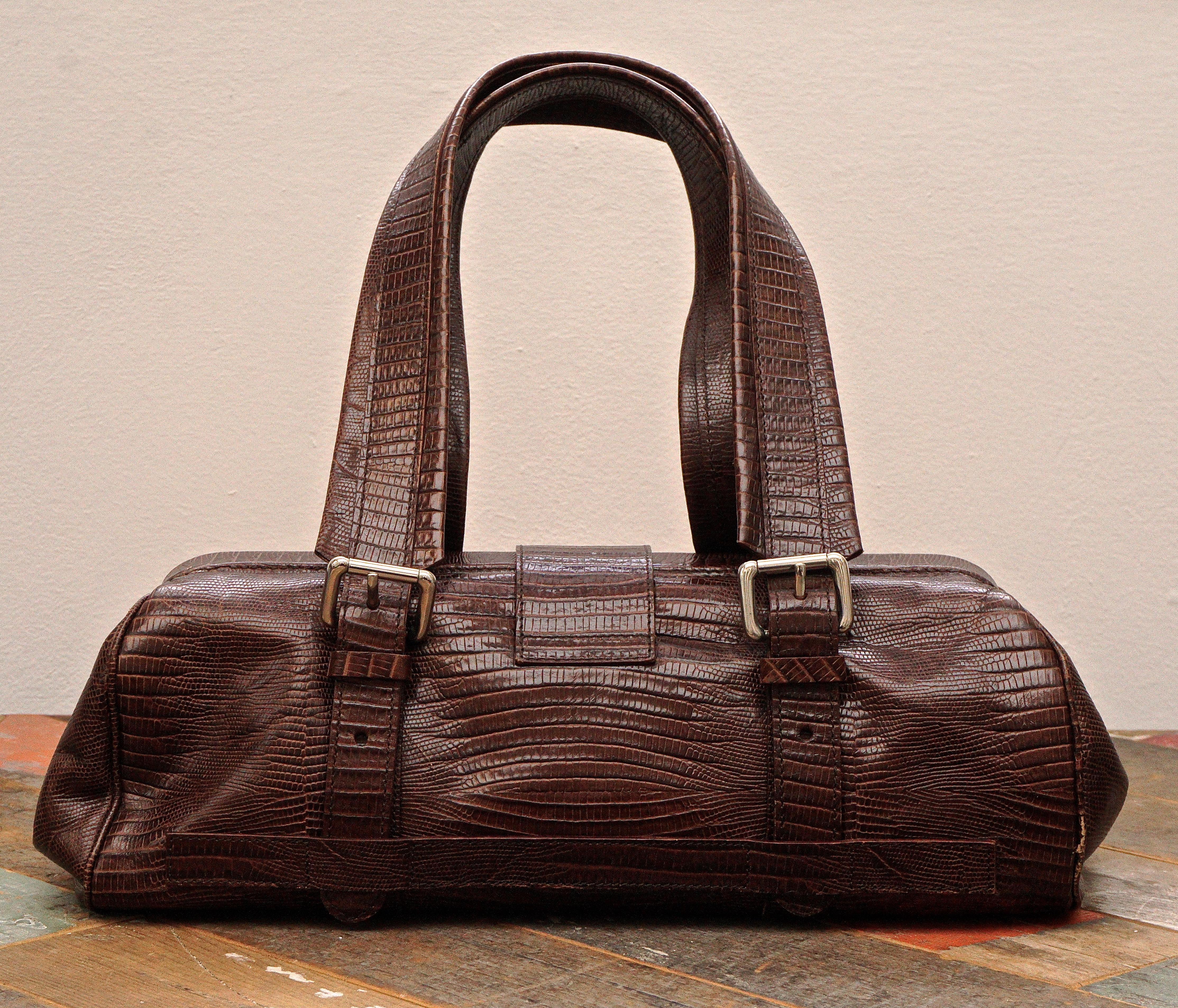 Liberty weekender bag in mid brown faux crocodile leather. Made in Italy.  Measuring maximum length 35.5cm / 13.97 inches at the base, height approximately 12.7cm / 5 inches, and maximum depth approximately 16cm / 6.3 inches. It has silver tone