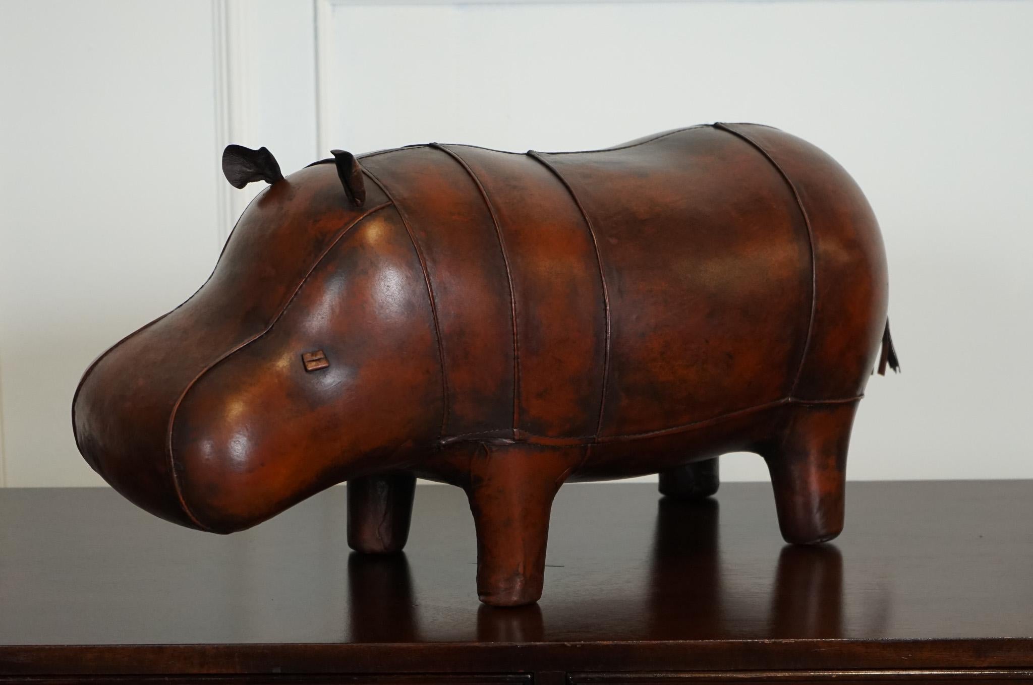 
Antiques of London



We are delighted to offer for sale this Liberty London Style Omersa Antique Brown Leather Hippo.

The Liberty London Style Omersa 'Antique Brown' Leather Footstool Hippo is a unique and charming piece that adds a touch of