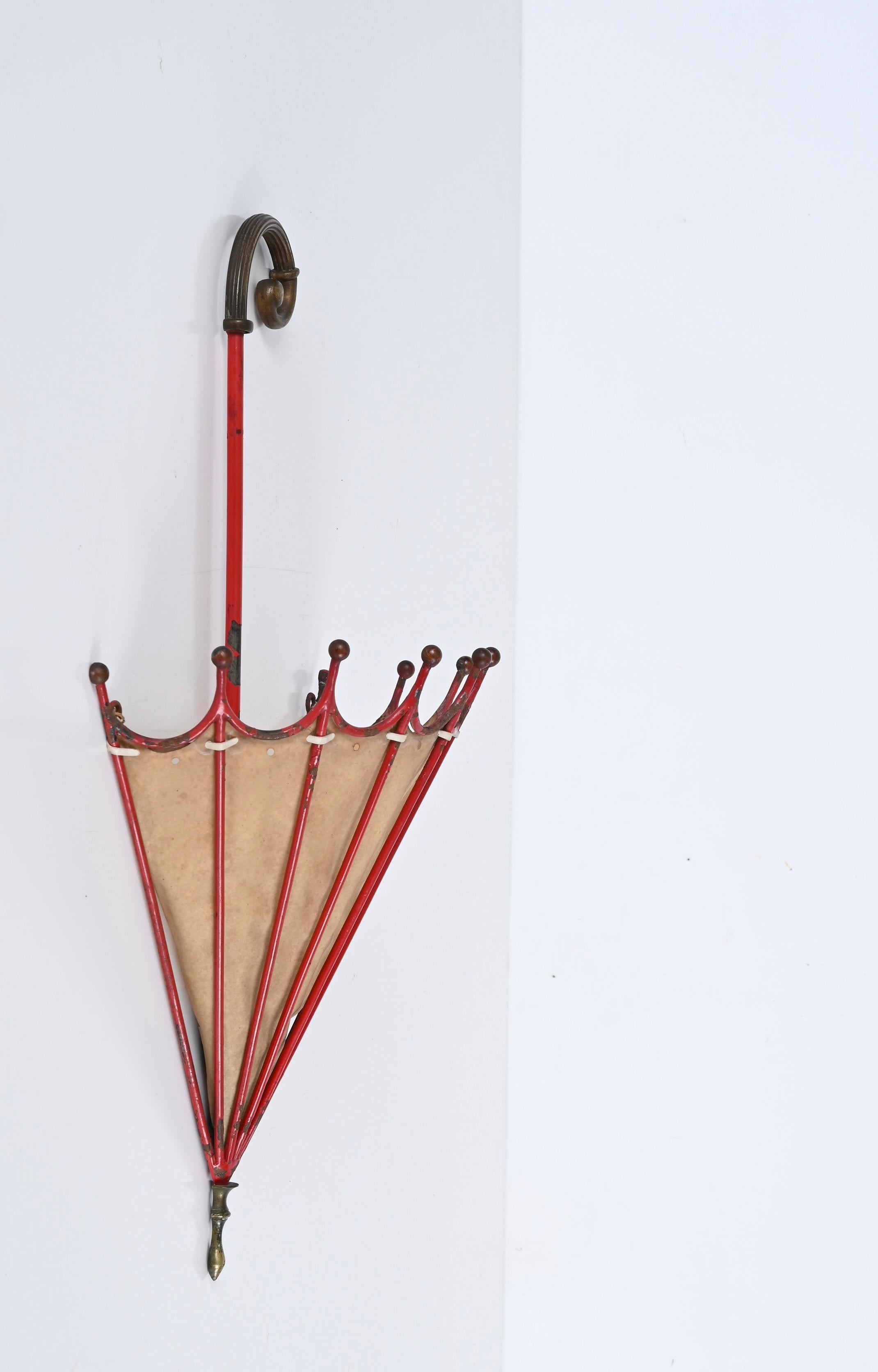 Marvellous Italian Liberty wall light. This unique sconce was produced in Italy in the 1920s. 

This lovely sconce was designed in the shape of an umbrella with the shade made in parchment paper. The structure is made in red enameled wrought iron