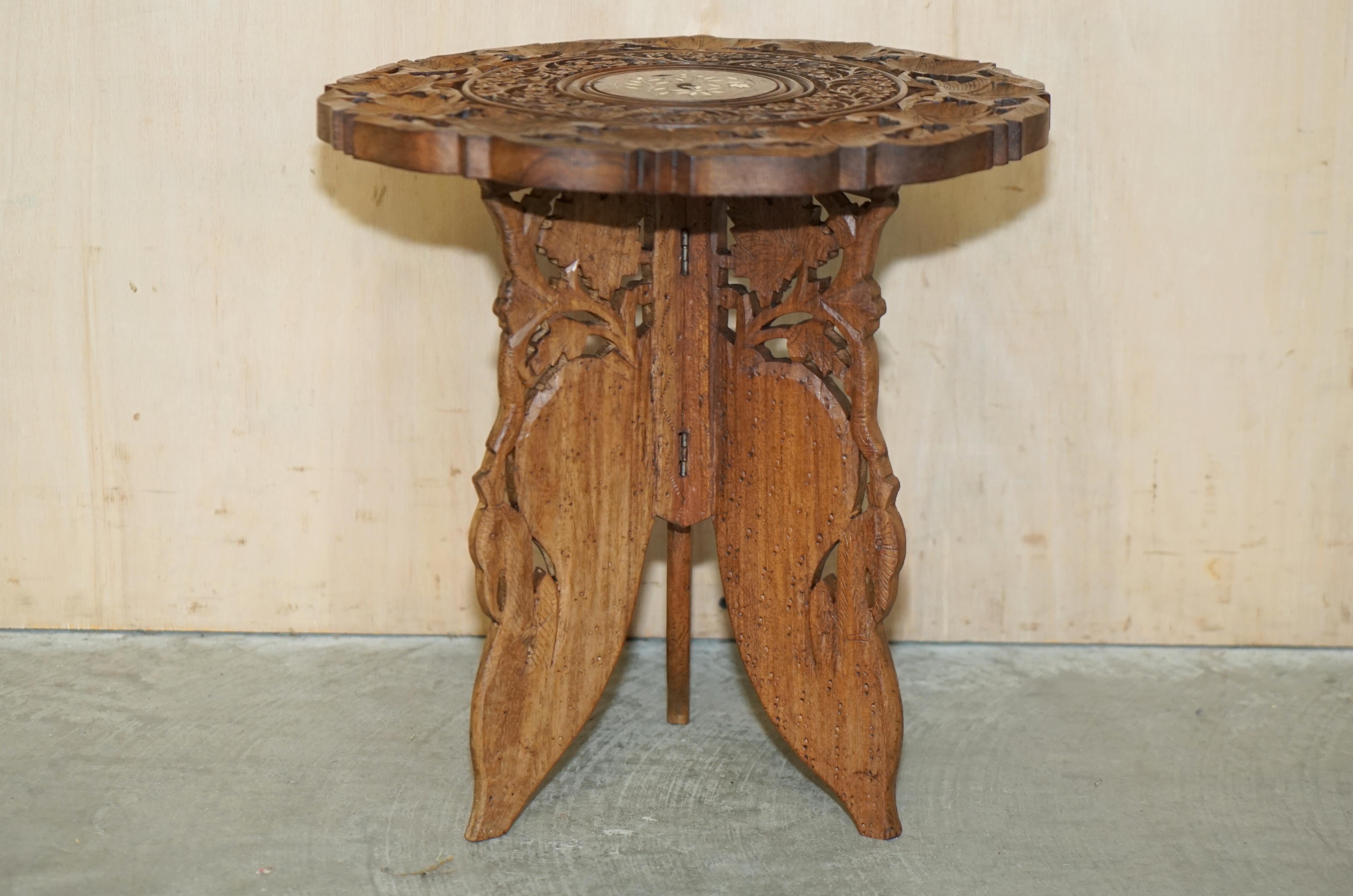 We are delighted to offer for sale this lovely, Liberty's London retailed, hand carved from solid Rosewood Burmese side table 

A very good looking and decorative table, this would be used as a lamp wine or side table

Carved from top to bottom