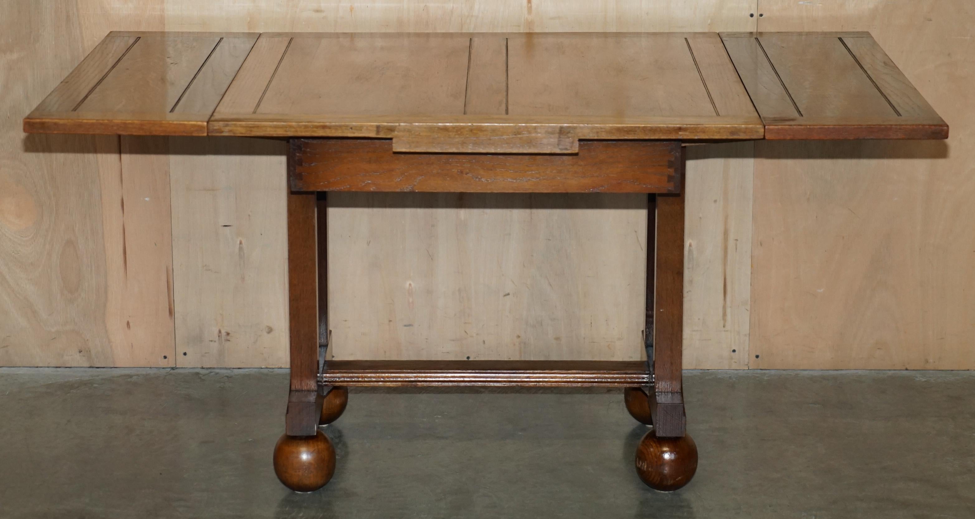 LIBERTYS COTSWOLD ART DECO OAK EXTENDING DINING TABLE CiRCA 1920 PART OF A SUITE For Sale 8