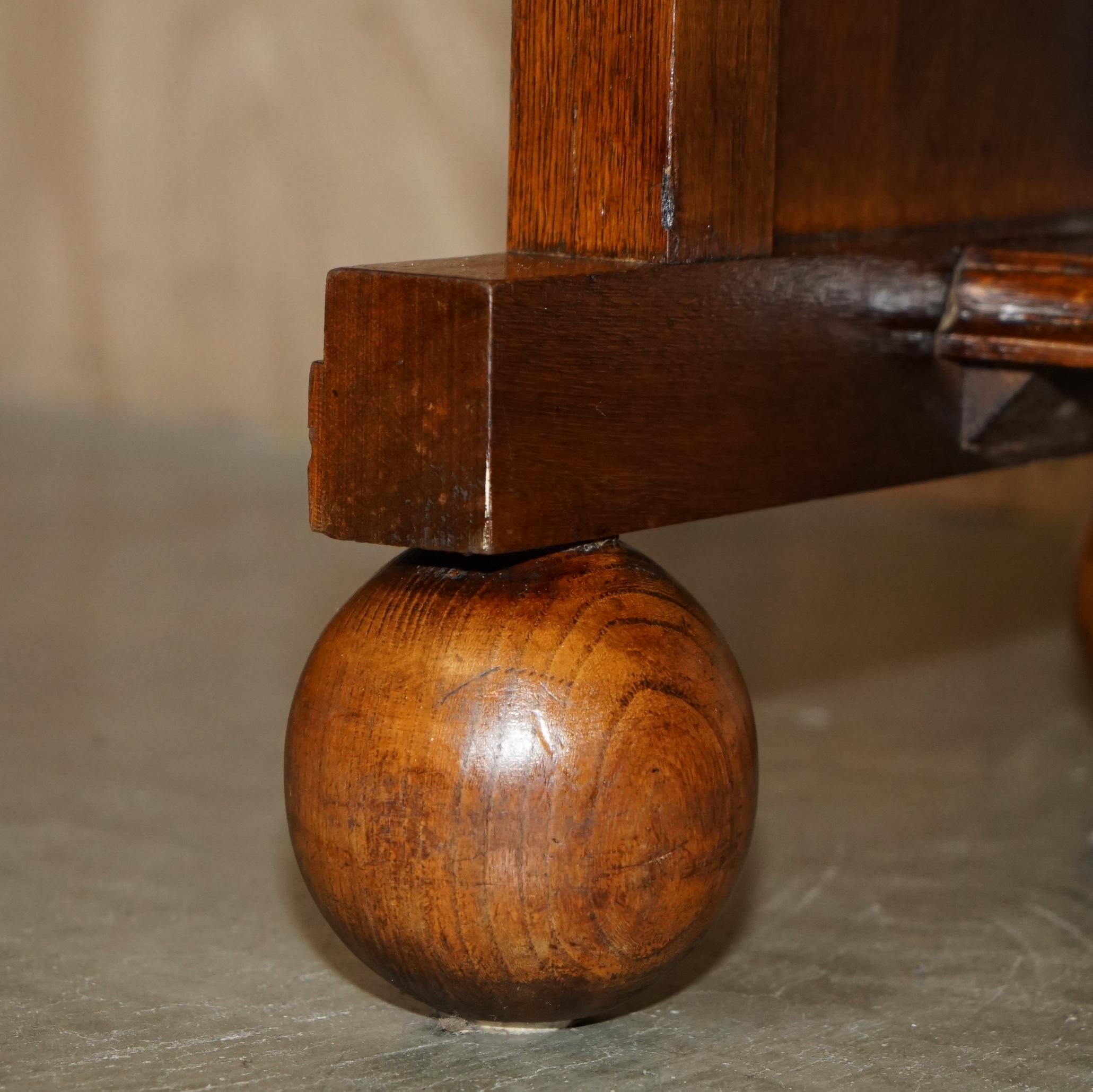 Hand-Crafted LIBERTYS COTSWOLD ART DECO OAK EXTENDING DINING TABLE CiRCA 1920 PART OF A SUITE For Sale