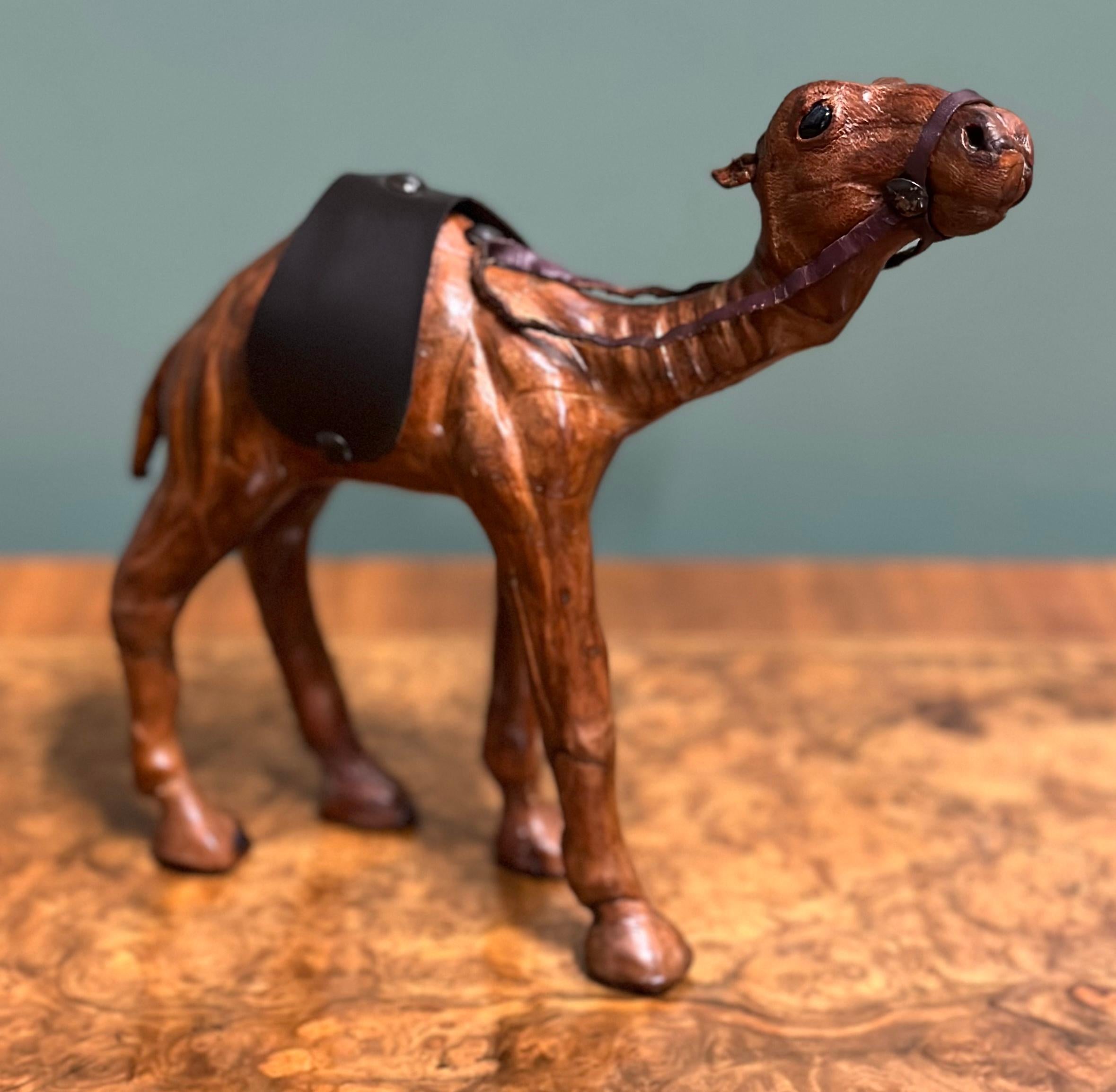 
We are excited to present this camel sculpture with lovely aged leather on hand-carved wood.
It has been made for Liberty's in London.

This lovely camel has both great aesthetic and decretive value.
It has been made for the kids of the wealthy