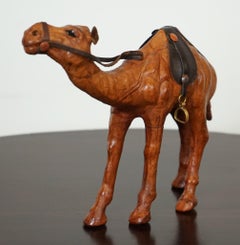 LIBERTY'S LONDON CAMEL SCULPTURE WiTH LOVELY AGED LEATHER ON HAND CARVED WOOD