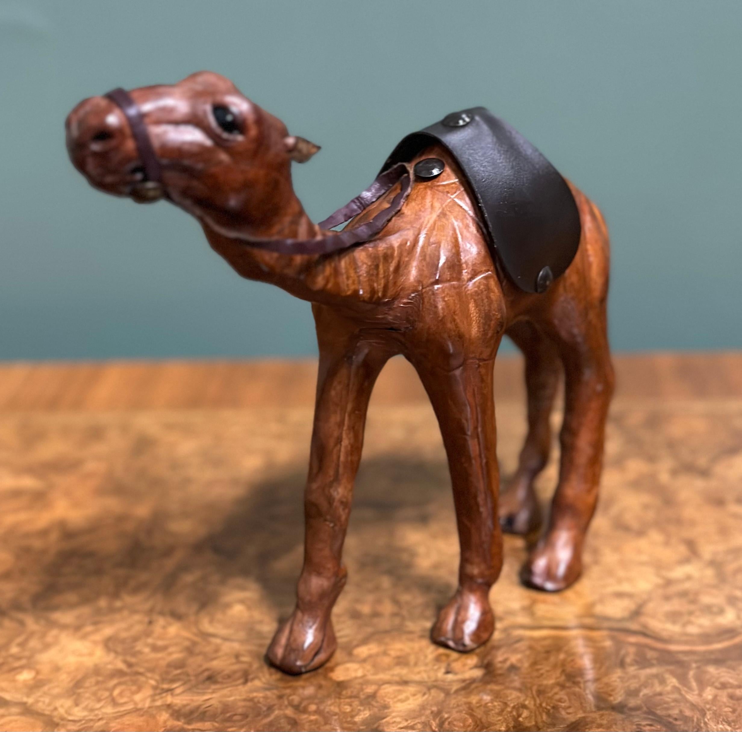 British LIBERTY'S LONDON CAMEL SCULPTURE WiTH LOVELY AGED LEATHER ON HAND CARVED WOOD  For Sale