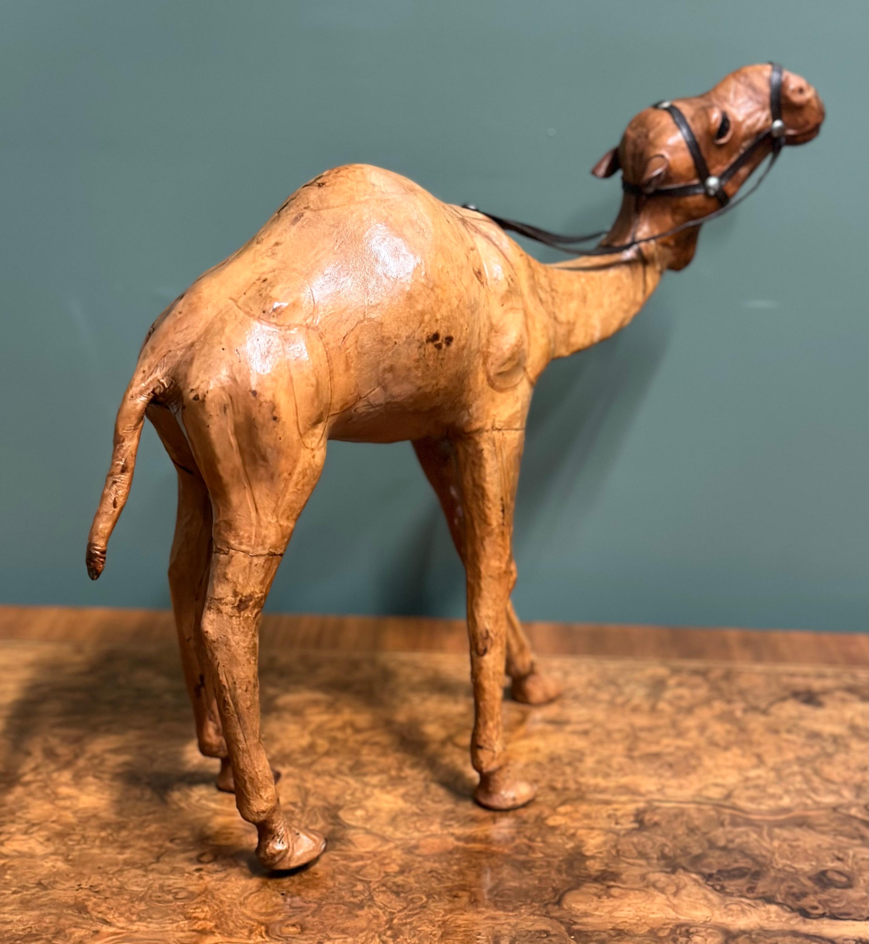 Hand-Crafted Liberty's London Camel Sculpture with Lovely Aged Leather on Hand Carved Wood For Sale