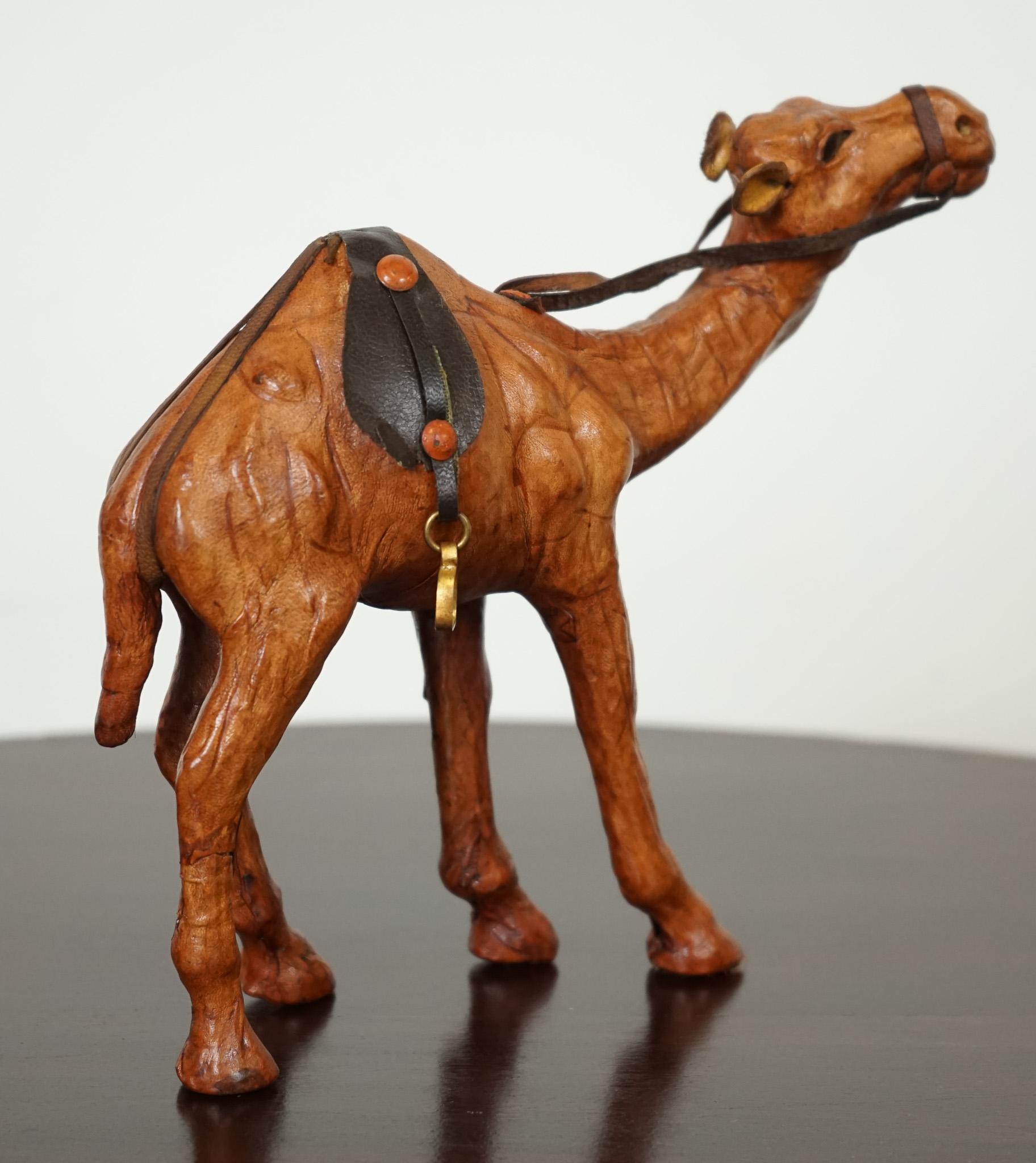 Hand-Crafted LIBERTY'S LONDON CAMEL SCULPTURE WiTH LOVELY AGED LEATHER ON HAND CARVED WOOD  For Sale