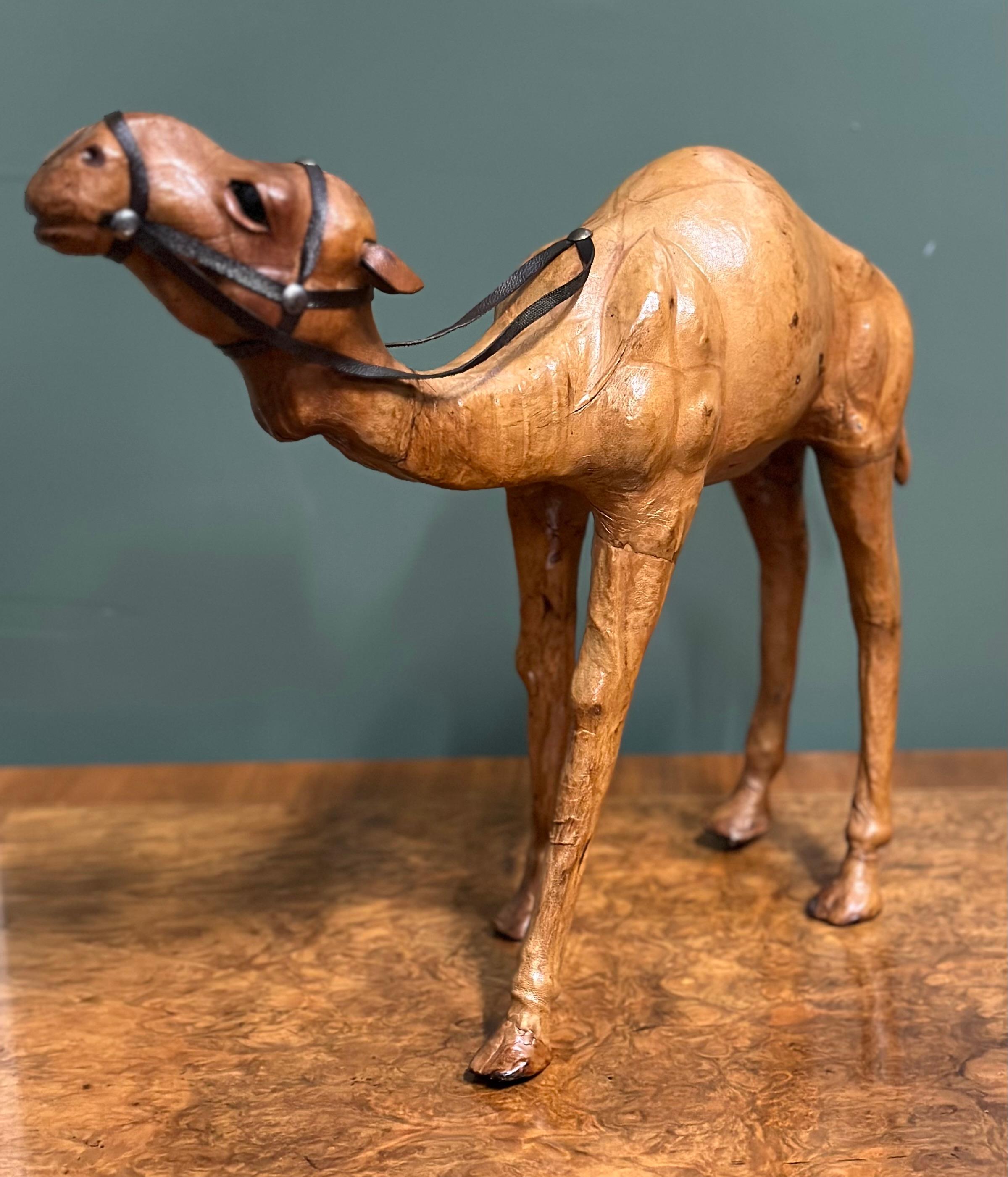 20th Century Liberty's London Camel Sculpture with Lovely Aged Leather on Hand Carved Wood For Sale