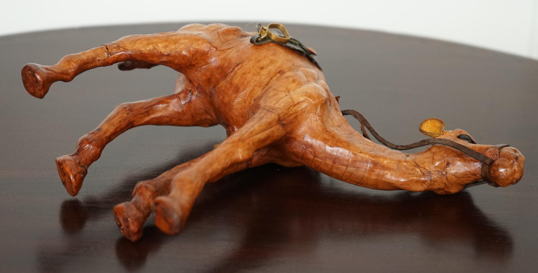 Leather LIBERTY'S LONDON CAMEL SCULPTURE WiTH LOVELY AGED LEATHER ON HAND CARVED WOOD  For Sale