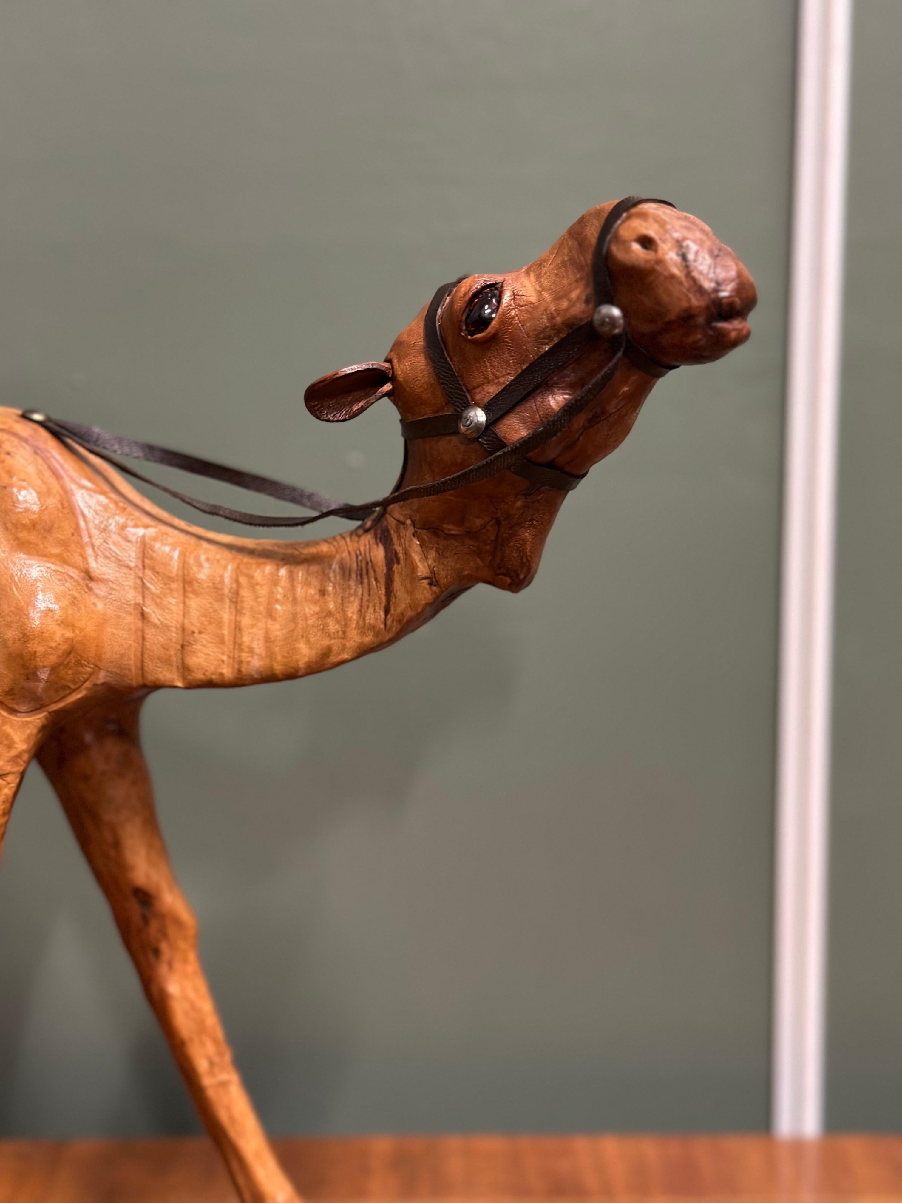 Liberty's London Camel Sculpture with Lovely Aged Leather on Hand Carved Wood For Sale 2