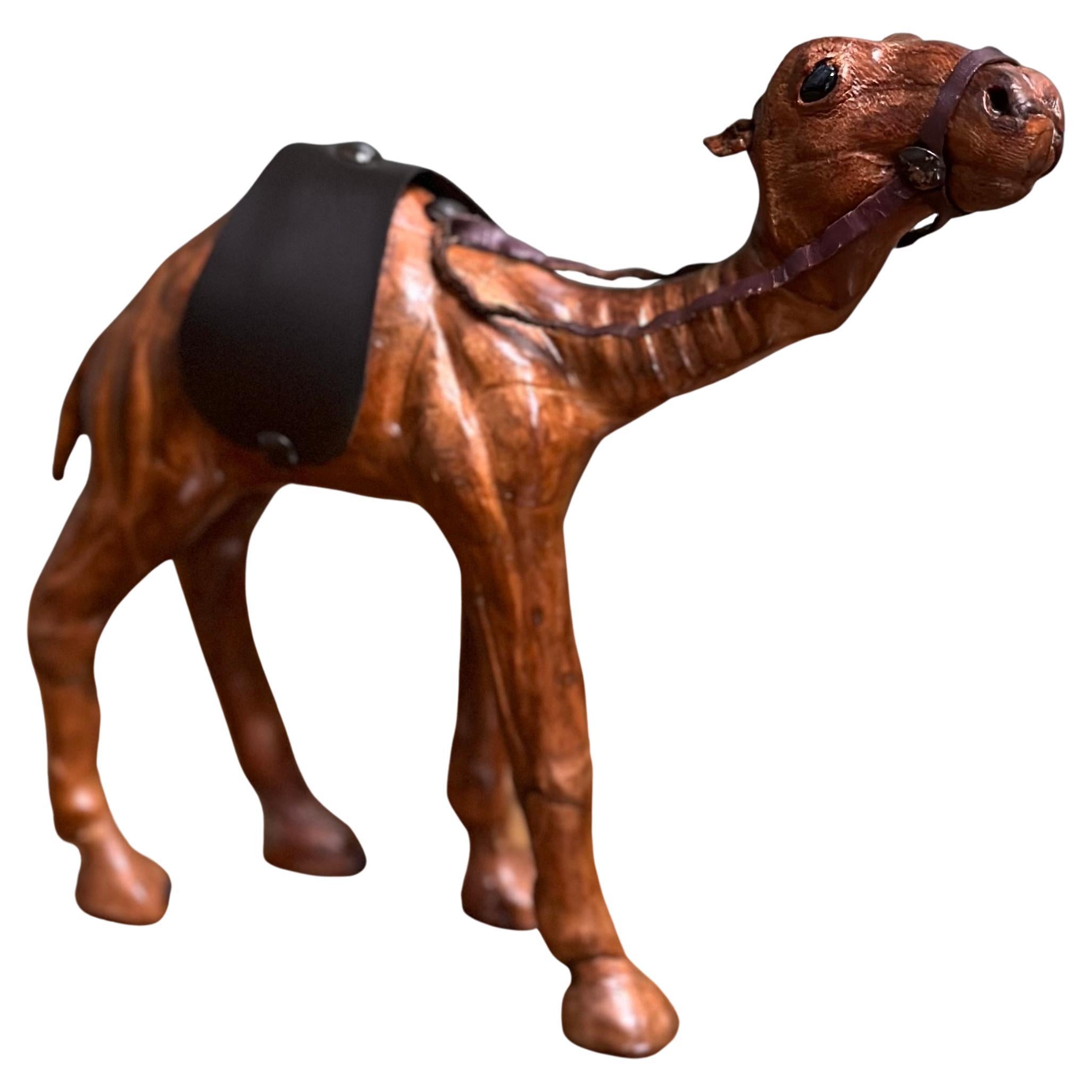 LIBERTY'S LONDON CAMEL SCULPTURE WiTH LOVELY AGED LEATHER ON HAND CARVED WOOD 