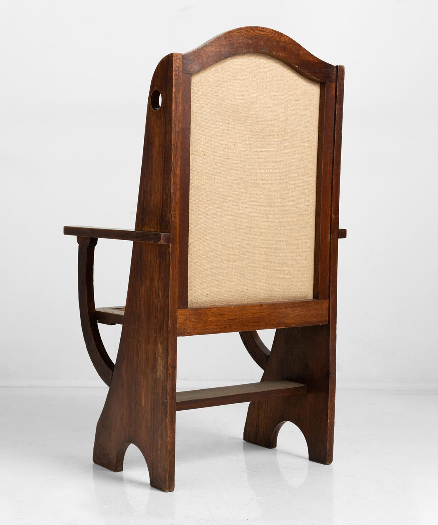 Oak frame in original condition with drop rush seat and upholstered backrest.
  