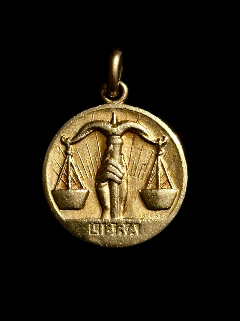 Libra Zodiac 18k Solid Yellow Gold Caduceus Pendant by Edmond Henri Becker Vintage French Zodiac Medal 

This exceptional 18K solid yellow gold pendant is a rare creation by the renowned French jeweler Edmond Henri Becker (1871-1971), a celebrated