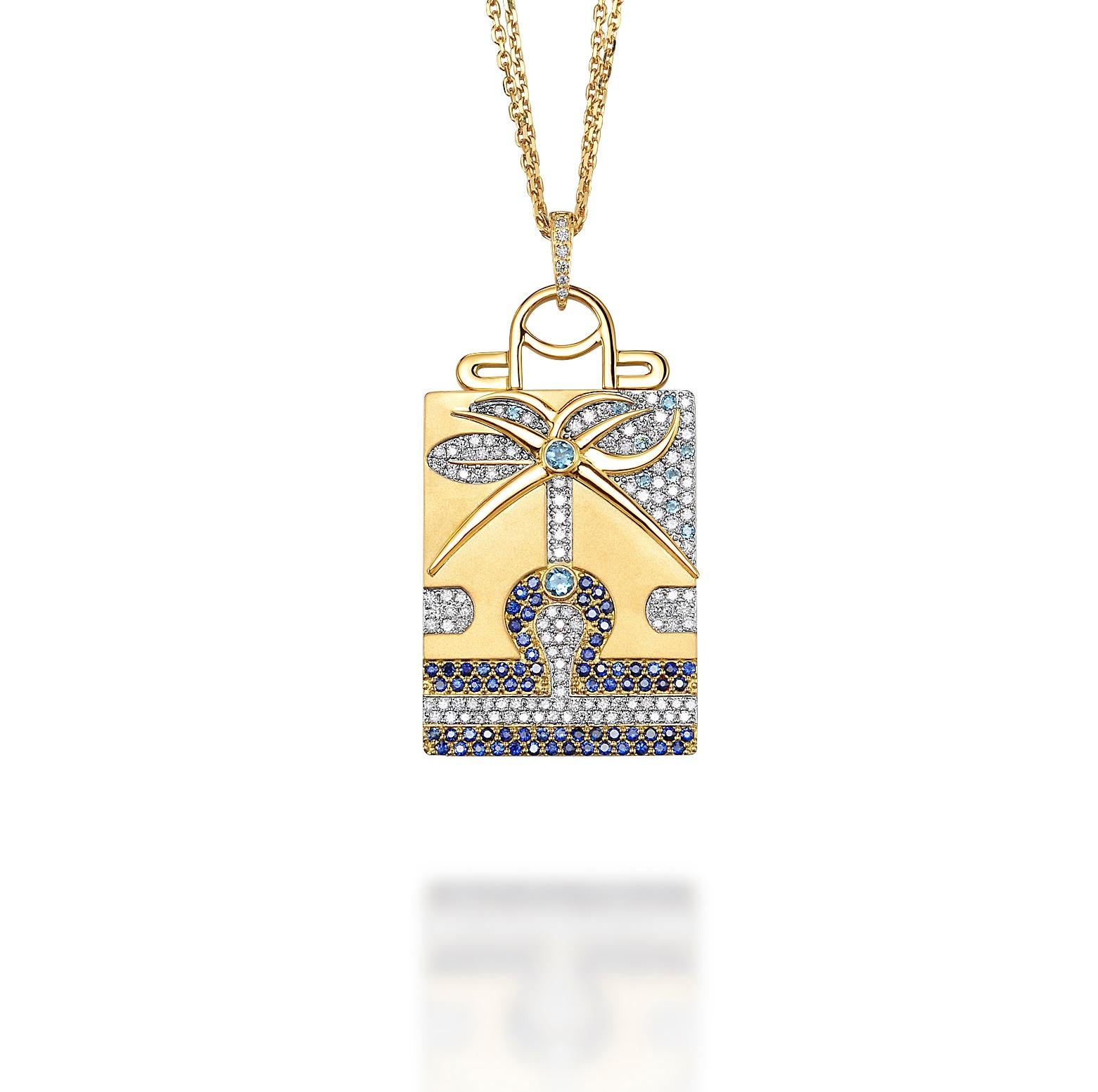 Libra zodiac pendant 18K yellow gold with diamonds, blue sapphire & aquamarine: 
Eminently concerned to coexist in peace and harmony with individual liberty of thought. Symbolized by the beauty and symmetry of „The Persian Garden“ that implies