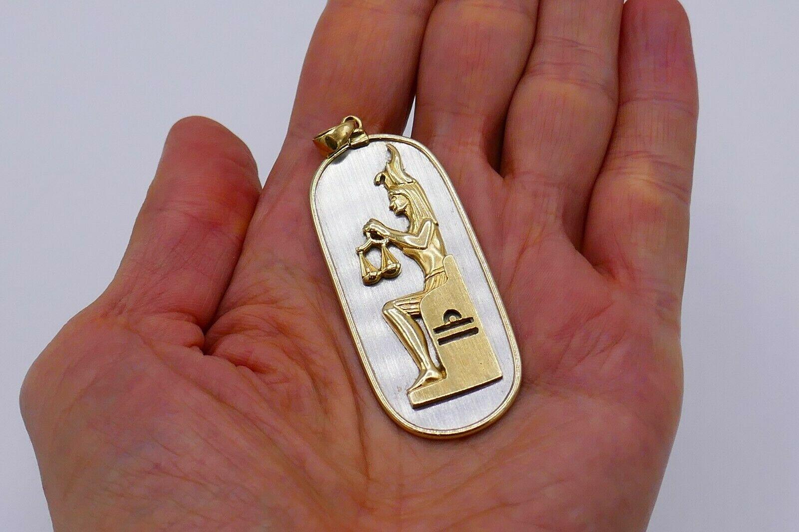 Amazing vintage (1970s) Libra astrological sign pendant made of 14k yellow and white gold. Stamped with a maker's mark and a hallmark for 14k gold.
Measurements: 2.5