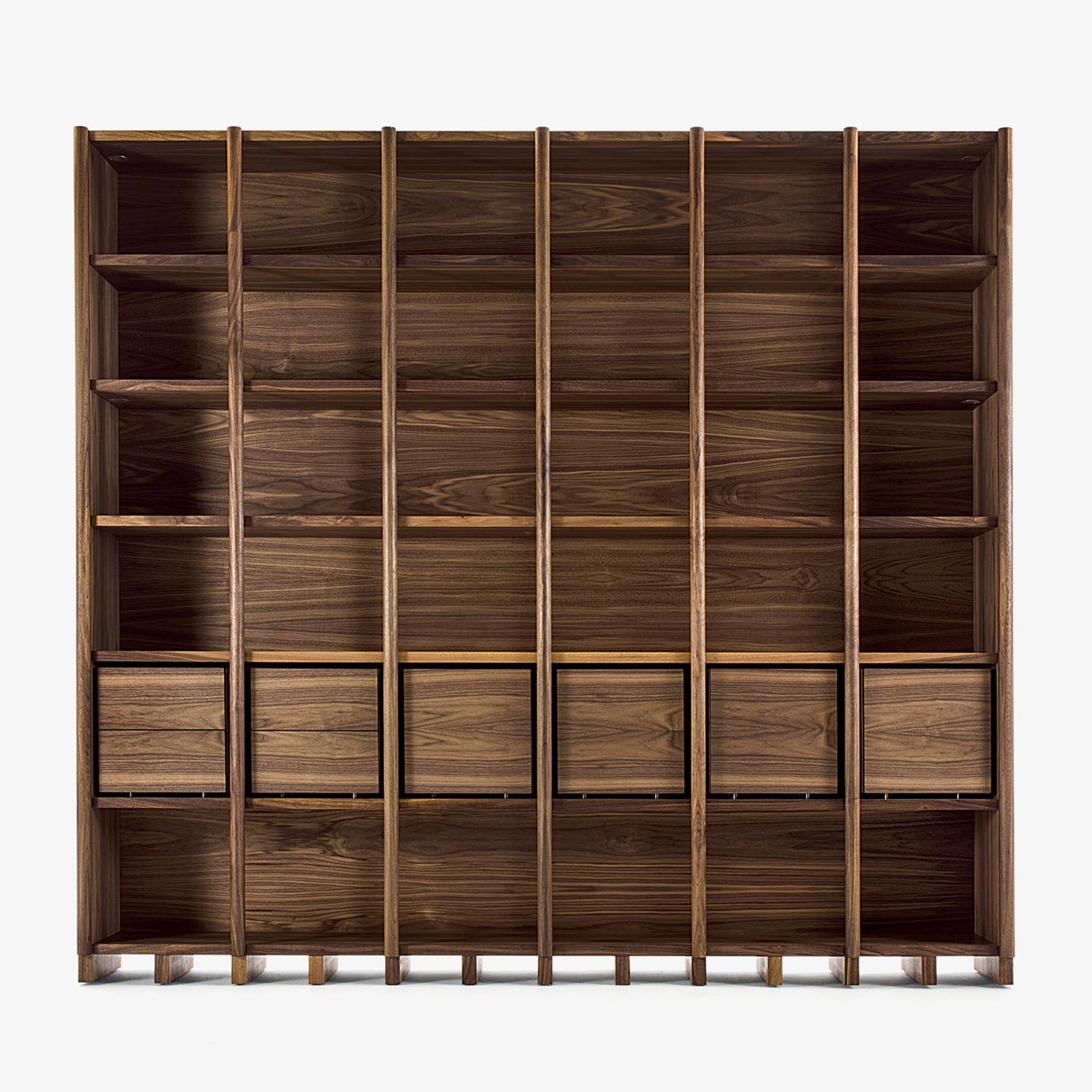 Bookcase library with solid walnut wood structure,
with modular shelves and sides system according
to furnishing needs. With 2 drawers module on the 
left side, with 2 doors module in the middle of the 
bookcase and with 2 big square drawers