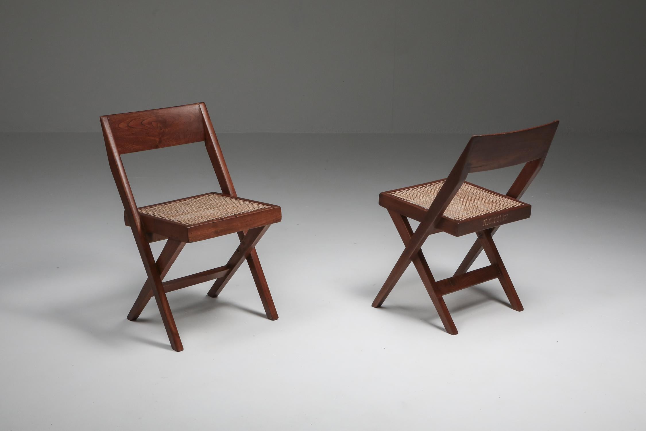 Pierre Jeanneret, library chair, a pair, India, 1952-1965

H.C 14 / 33, 43, 47, 79
Meaning chairs nr 33, 43, 47, 79 for Room 14 of the High Court of Chandigarh
It's a rare feat to have the chairs perfectly identifiable.

Another interesting