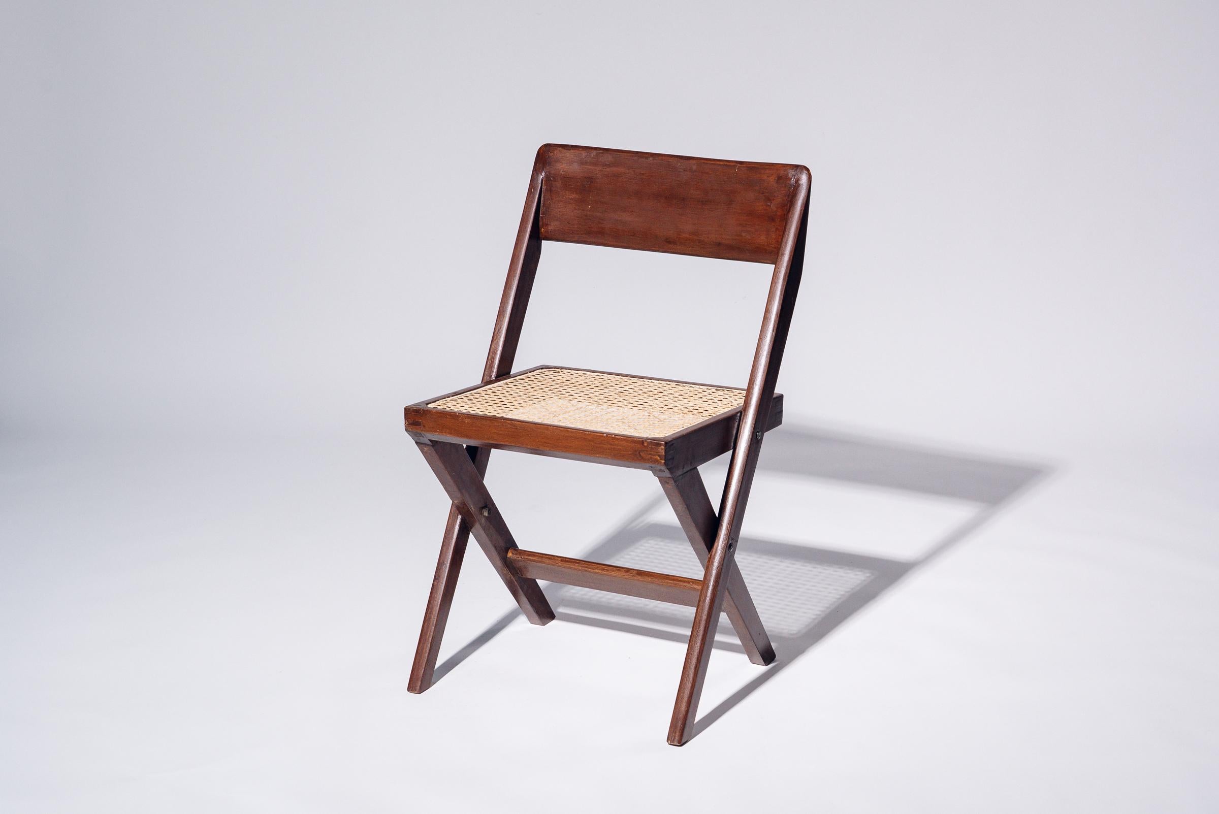 An authentic mid-century piece from Pierre Jeanneret’s legendary Chandigarh commission. Teak frame with hand-woven bamboo-rattan seat.