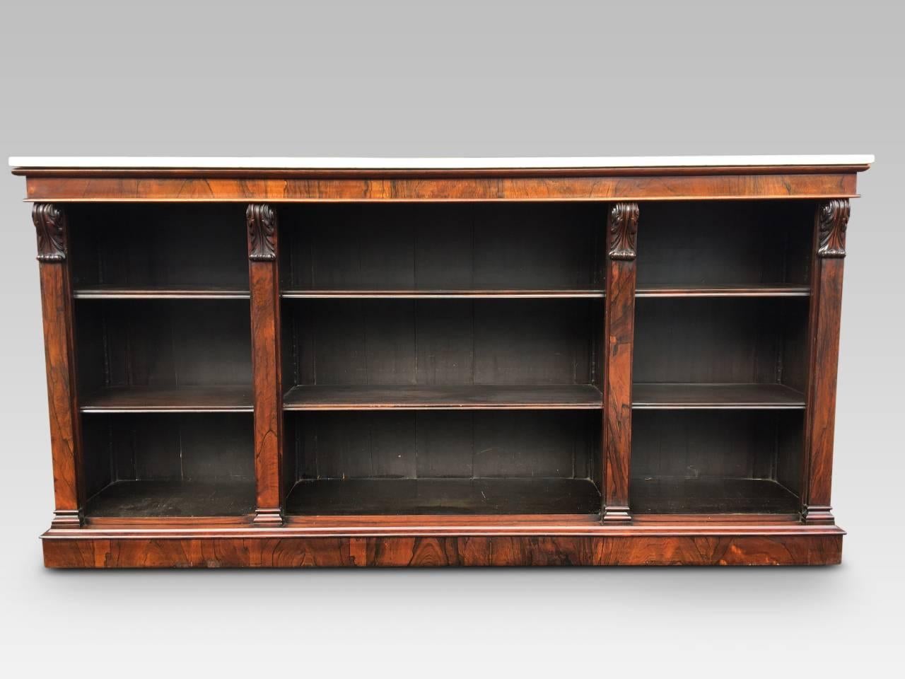 Superb long  and deep rosewood open bookcase, English, and dated to circa 1850. A most attractive and useful item with a glorious antique patination.  

This delightful library bookcase has loads of book space with six substantial and adjustable