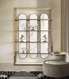 EL030 bookcase made of gold-plated metal, glass and Calacatta Oro marble