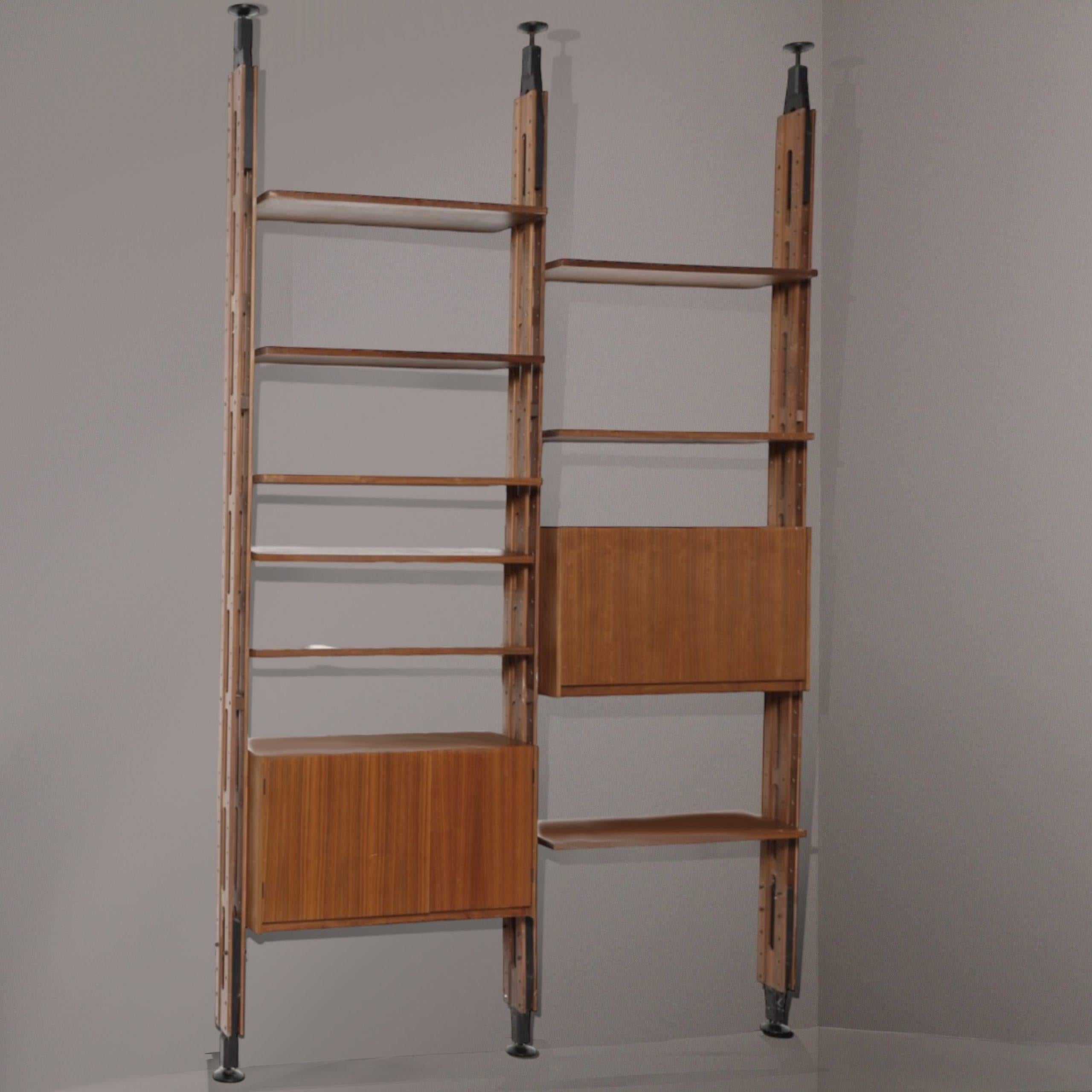 Paolo Tilche's Giraffe Bookcase, designed in the 1960s, is a masterpiece of Italian modernist design. Made of teak wood, this bookcase is renowned for its sturdiness and quality materials. The modular design, available in 2-, 3-, or 4-bay versions,