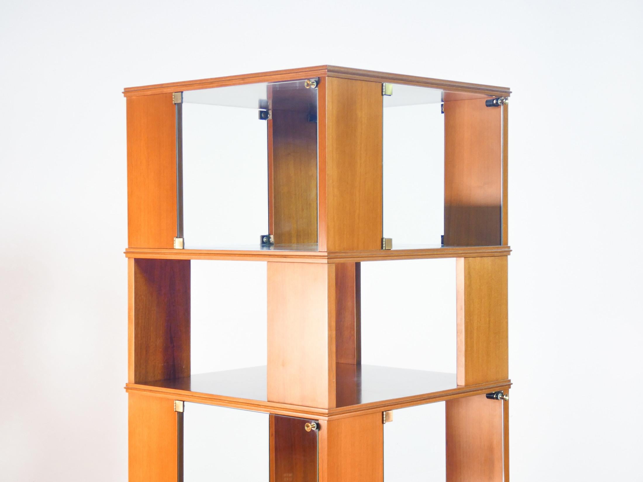 Glass Wooden center swivel bookcase, six shelves. Italy, 60s For Sale