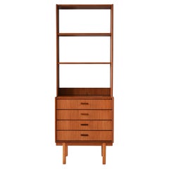 Libreria in teak con cassetti