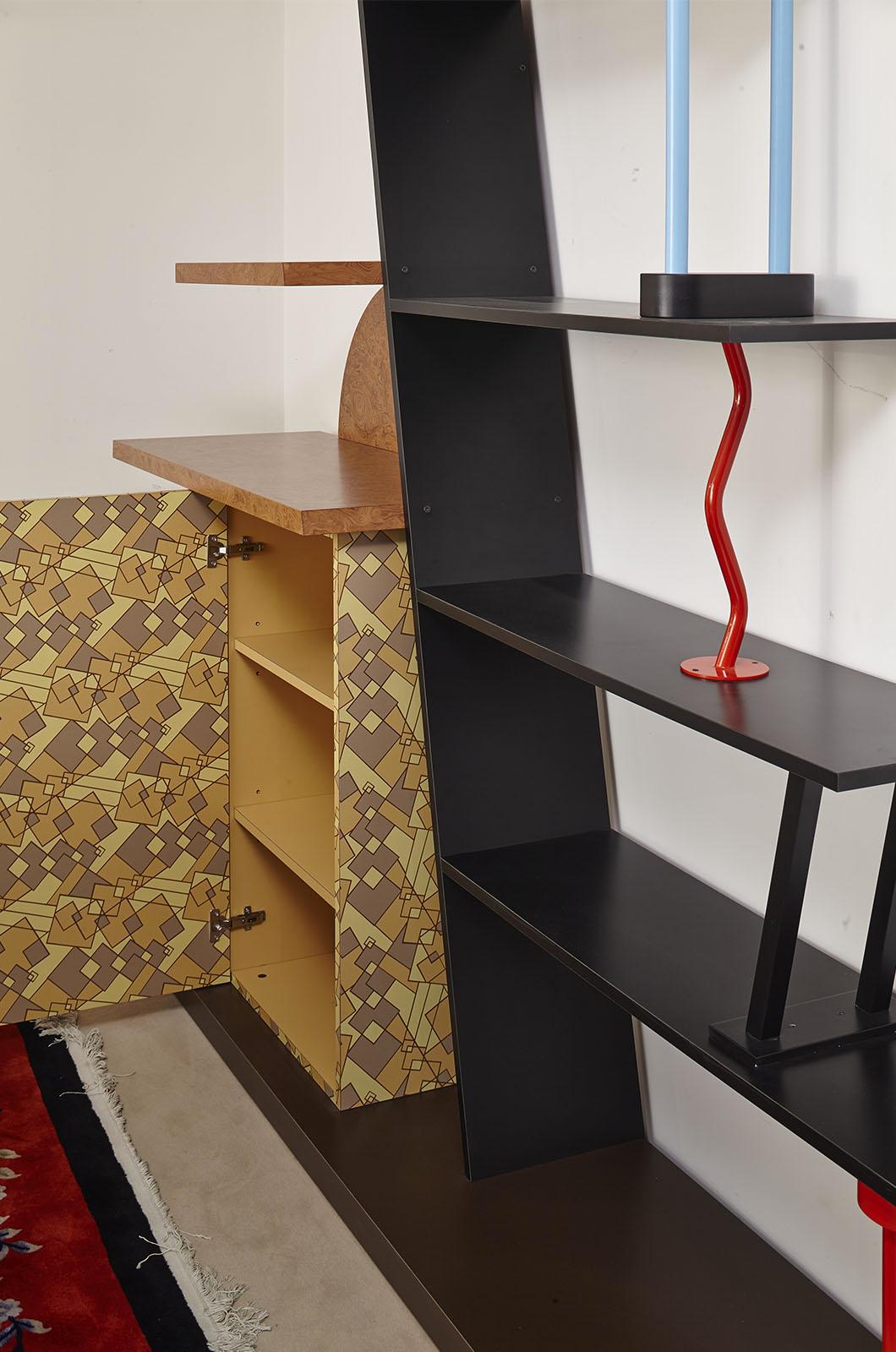 Malabar is a cabinet-bookcase designed by Ettore Sottsass for Memphis Milano in 1982 and purchased in 2000. Production number 21. Sold with certificate of Authenticity. Featuring shelves connected with each other by painted metal elements, and