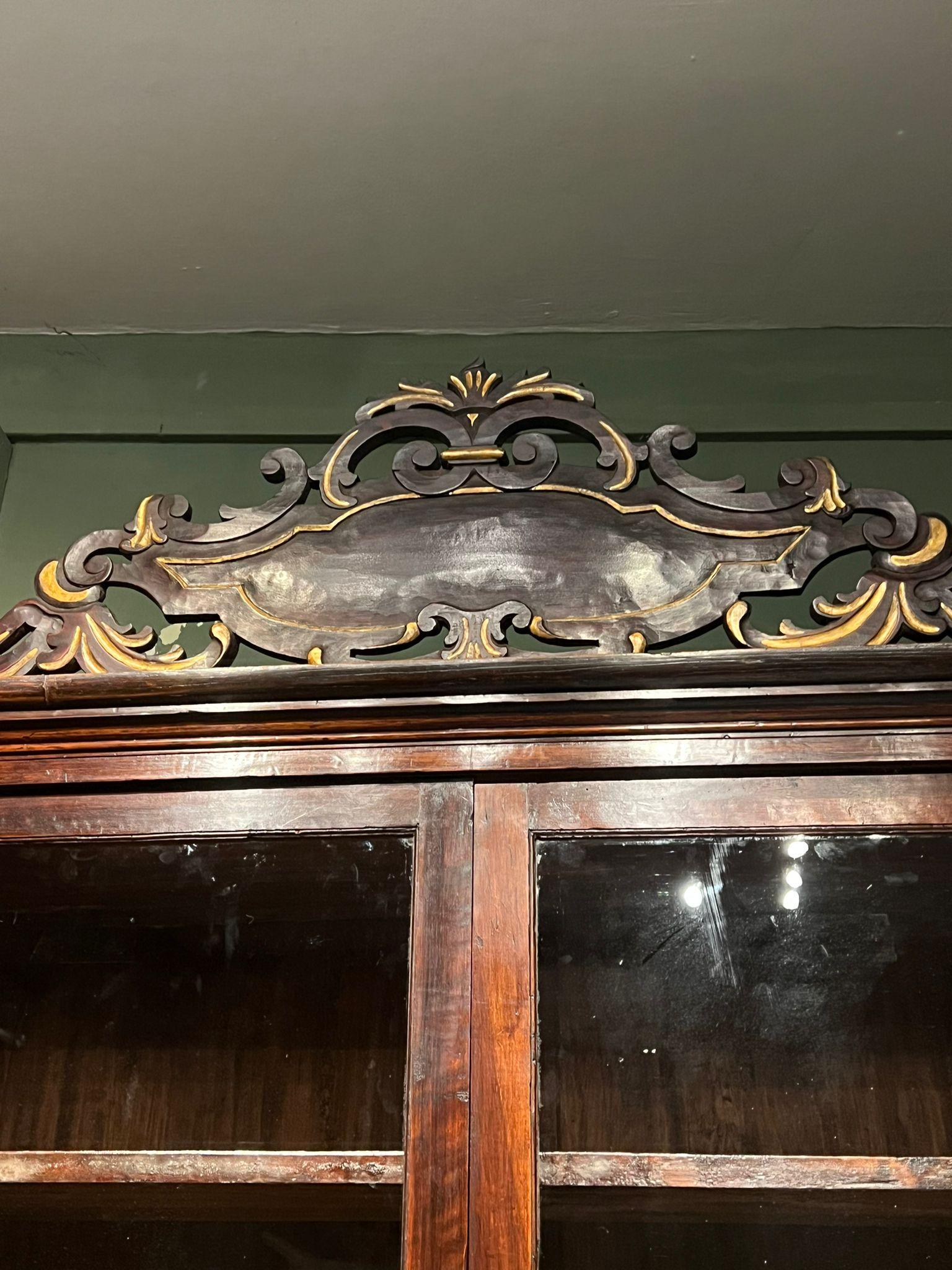 Carved Bookcase dating back to the late 18th century For Sale