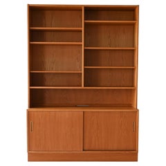 Scandinavian bookcase with storage compartment