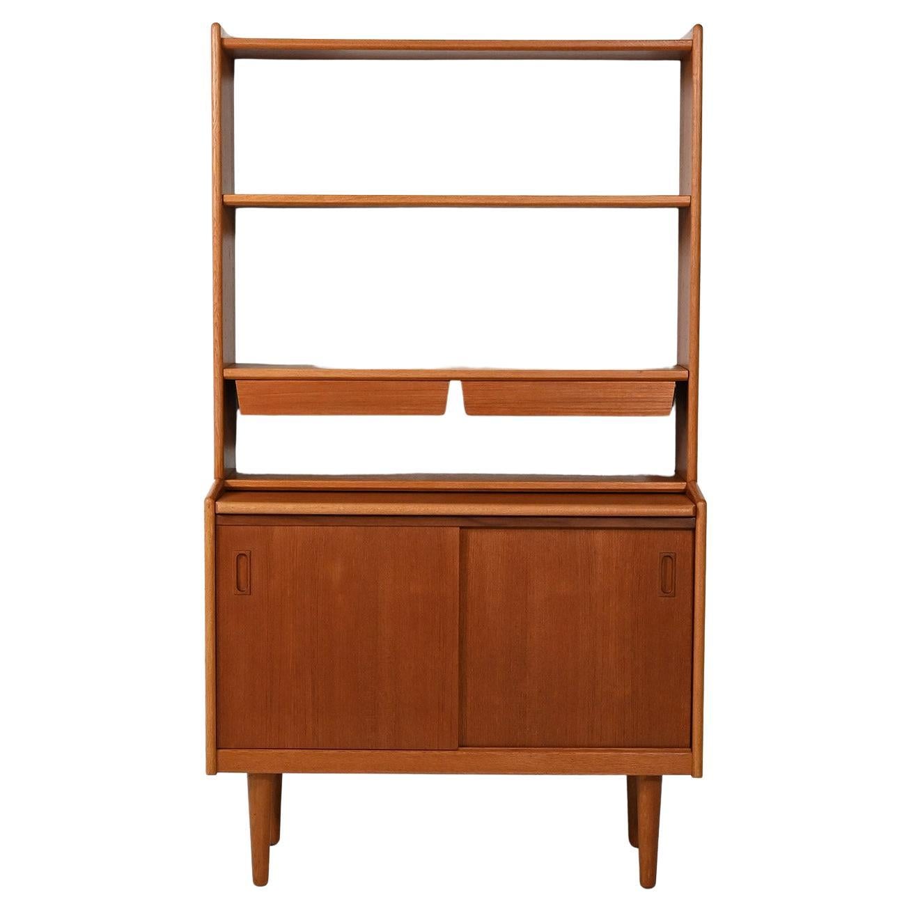 Scandinavian teak bookcase with hanging drawers