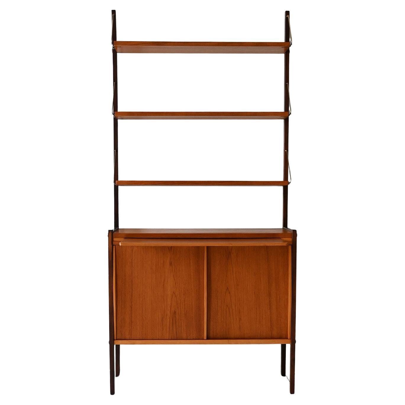 Vintage Scandinavian bookcase with pull-out desk and brass pulls For Sale