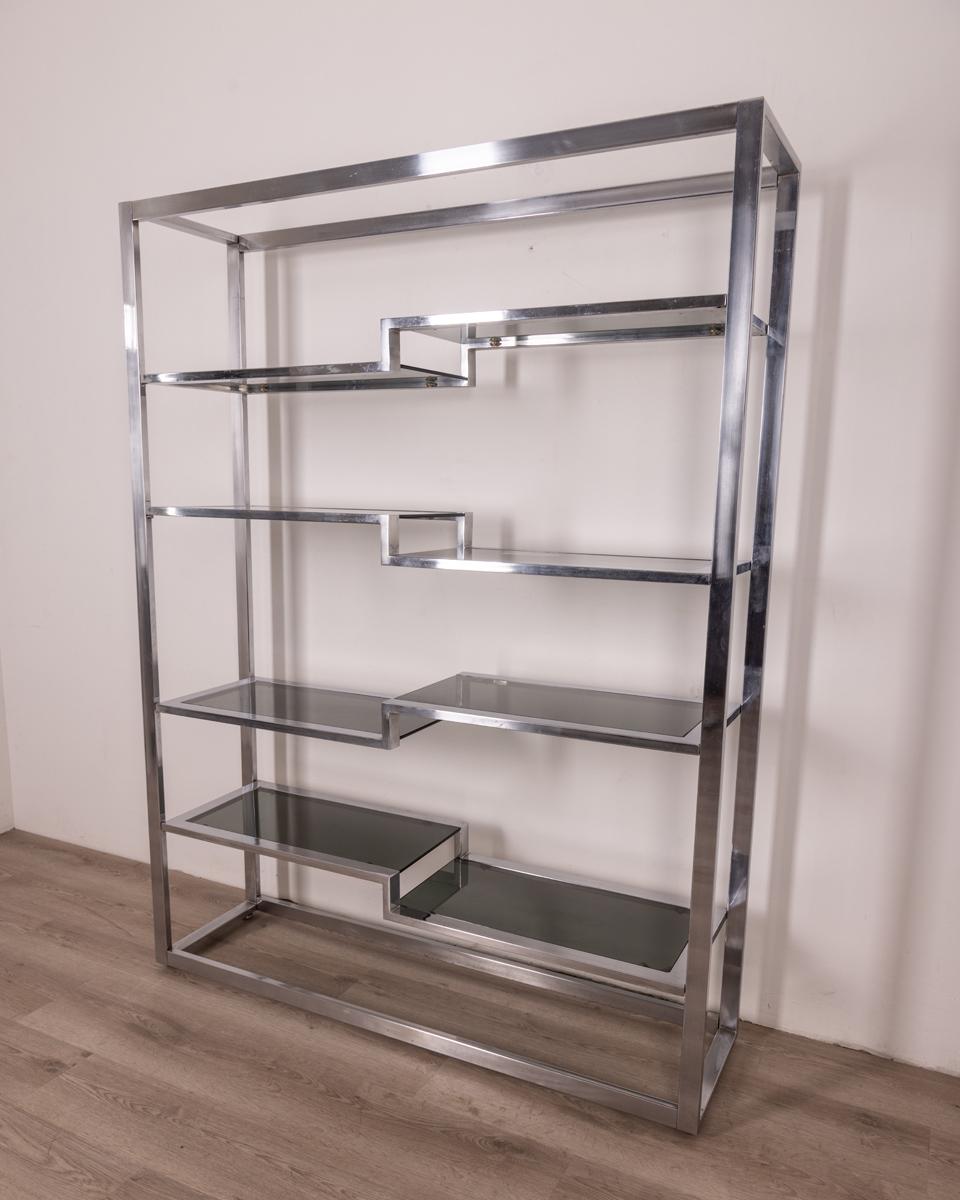 Metal Vintage 1970s chrome metal and glass bookcase Italian design For Sale
