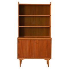Used bookcase with pull-out shelf
