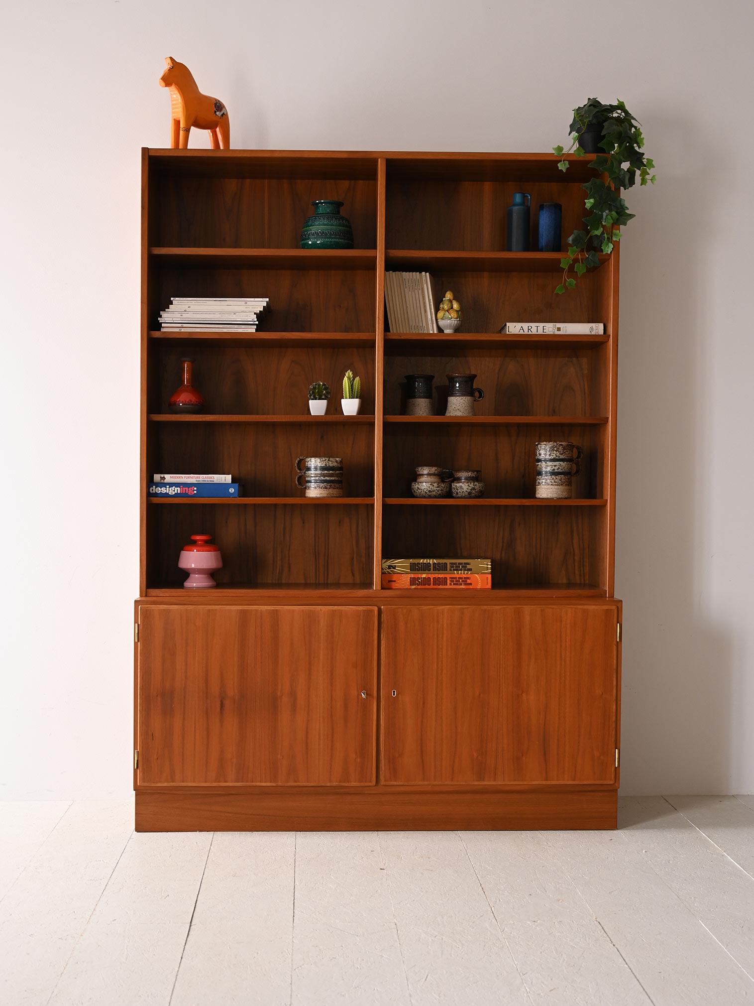 With a generous combination of open shelves and wide doors, it offers the perfect blend of display and storage. The high quality of the material and care in the workmanship make it a piece of furniture that not only enriches the aesthetics of a