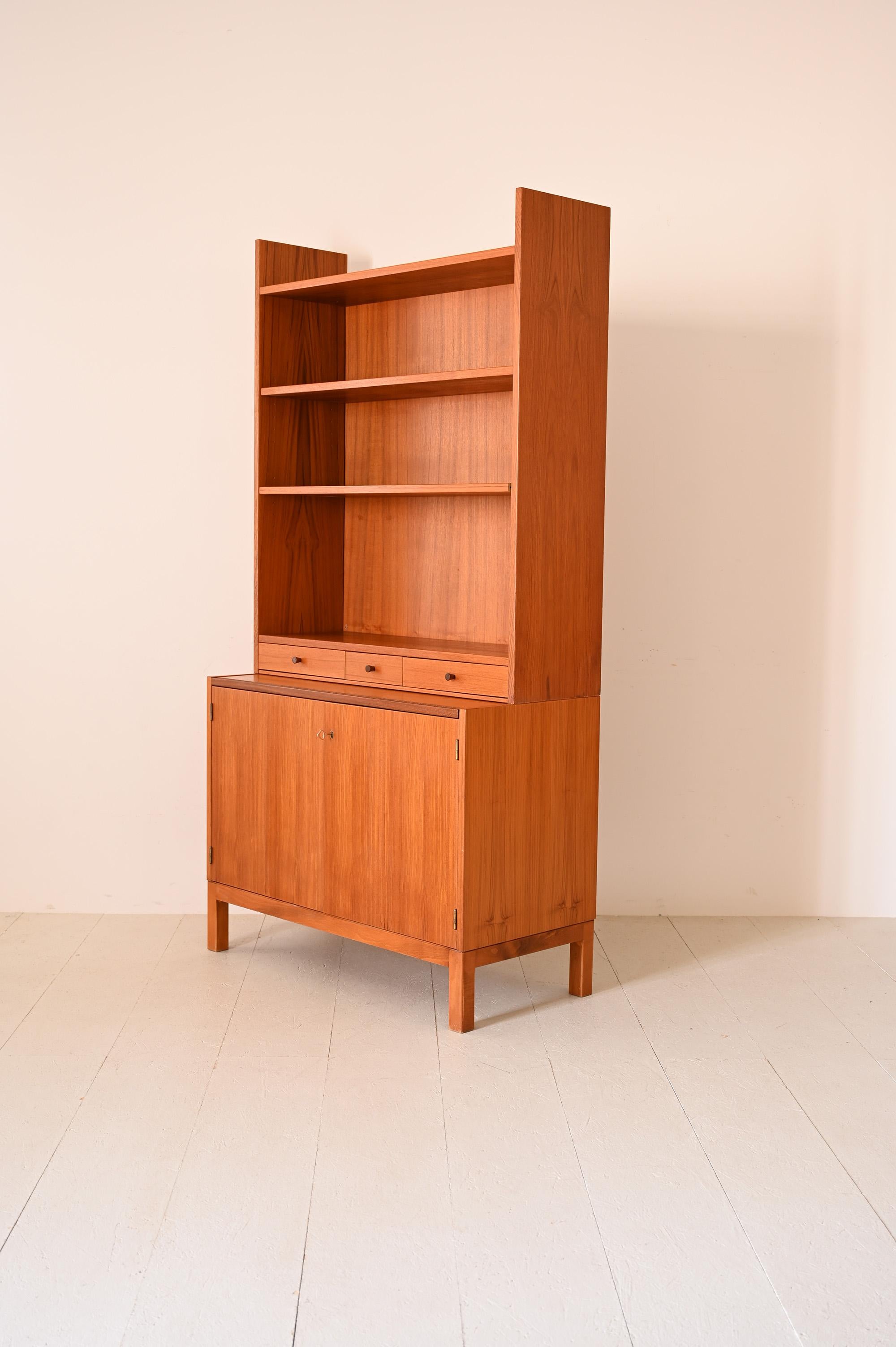 Scandinavian Modern Vintage Danish style bookcase with pull-out shelf For Sale