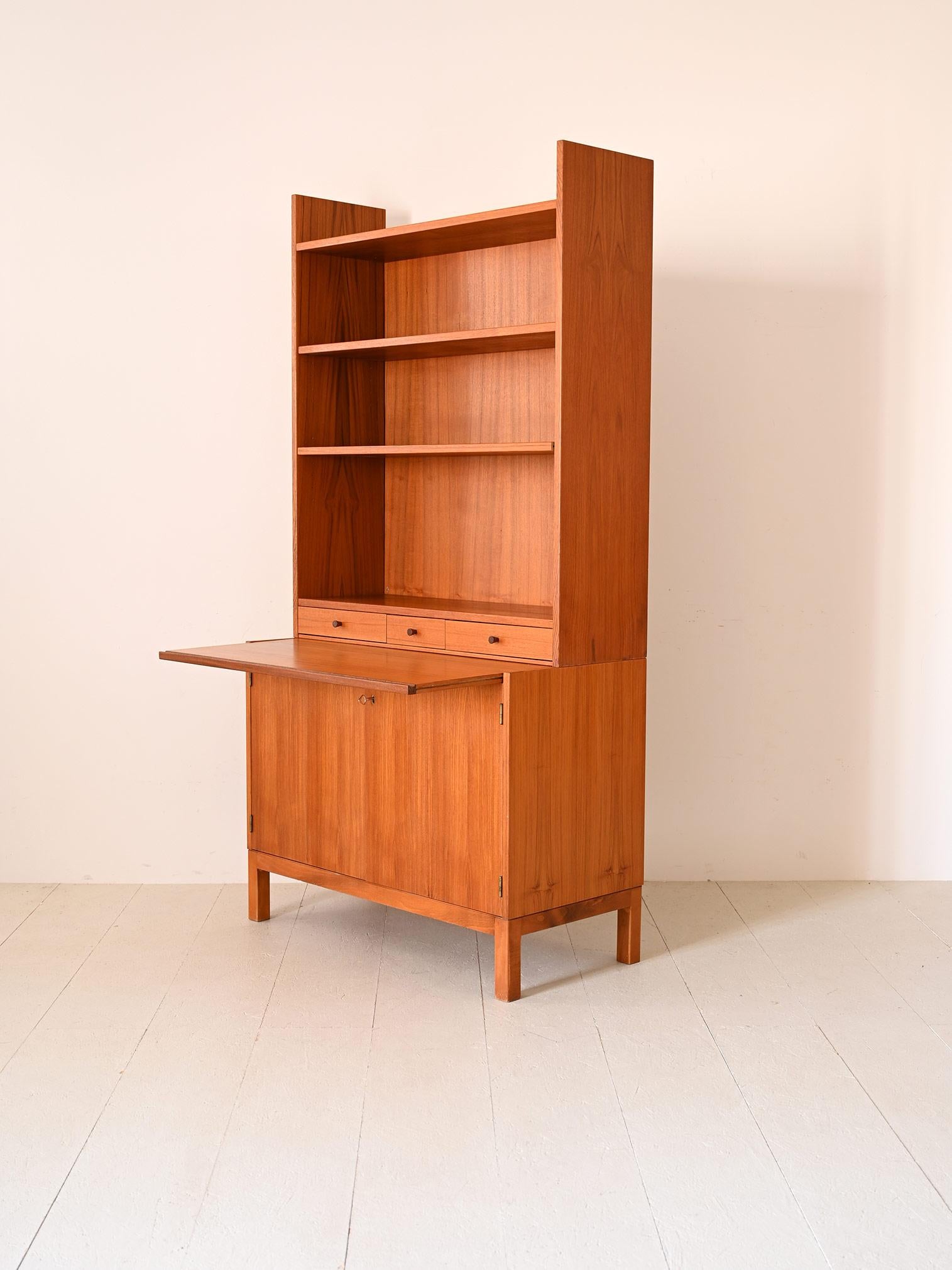 Teak Vintage Danish style bookcase with pull-out shelf For Sale