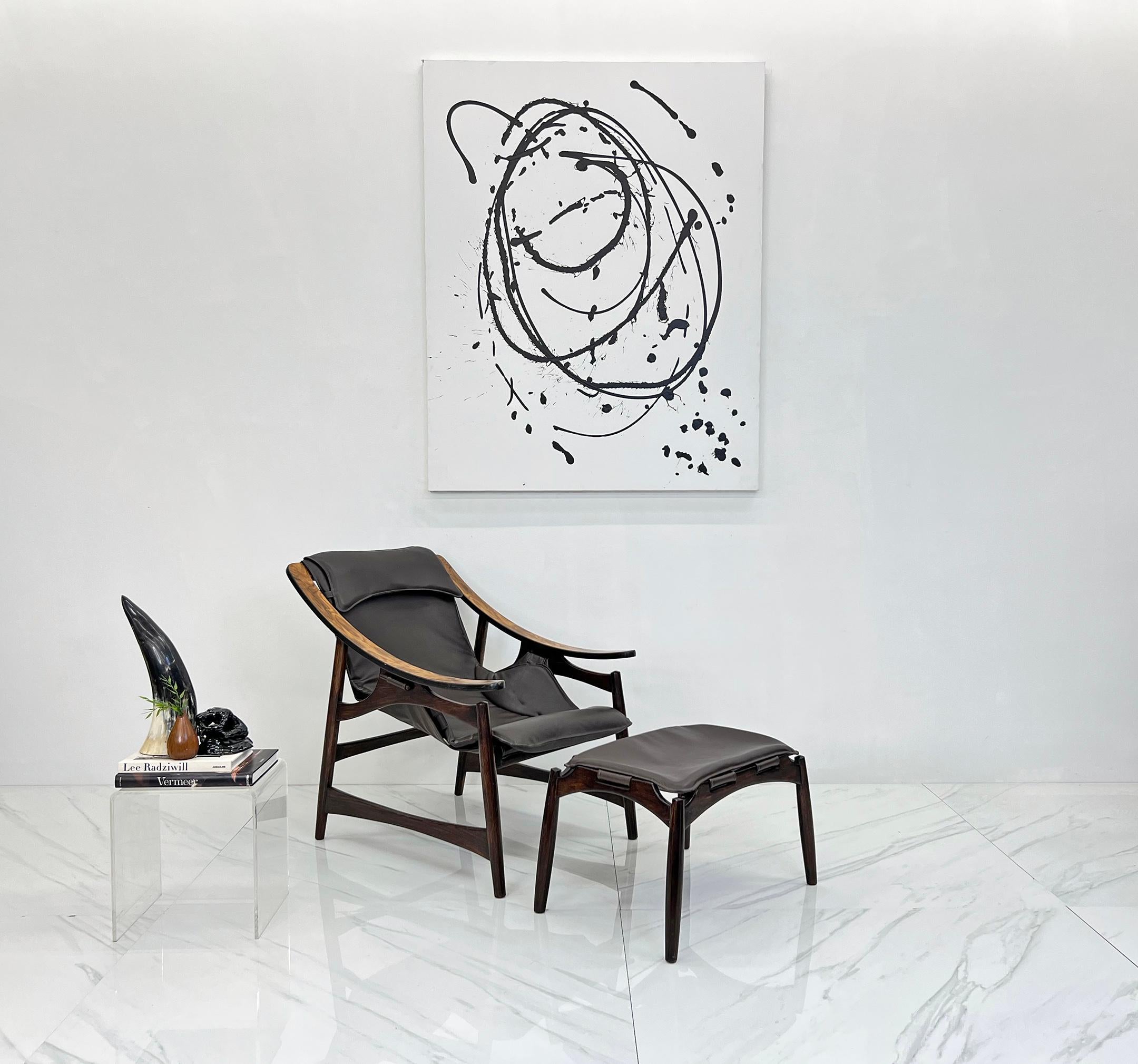 This Groovy Rosewood Sling Chair by Liceu de Artes e Ofícios is a true Brazilian Mid Century Modern Gem.

Picture yourself lounging like a boss in the coolest chair straight from the '60s – the Rosewood Sling Chair by the groovy folks at Liceu de