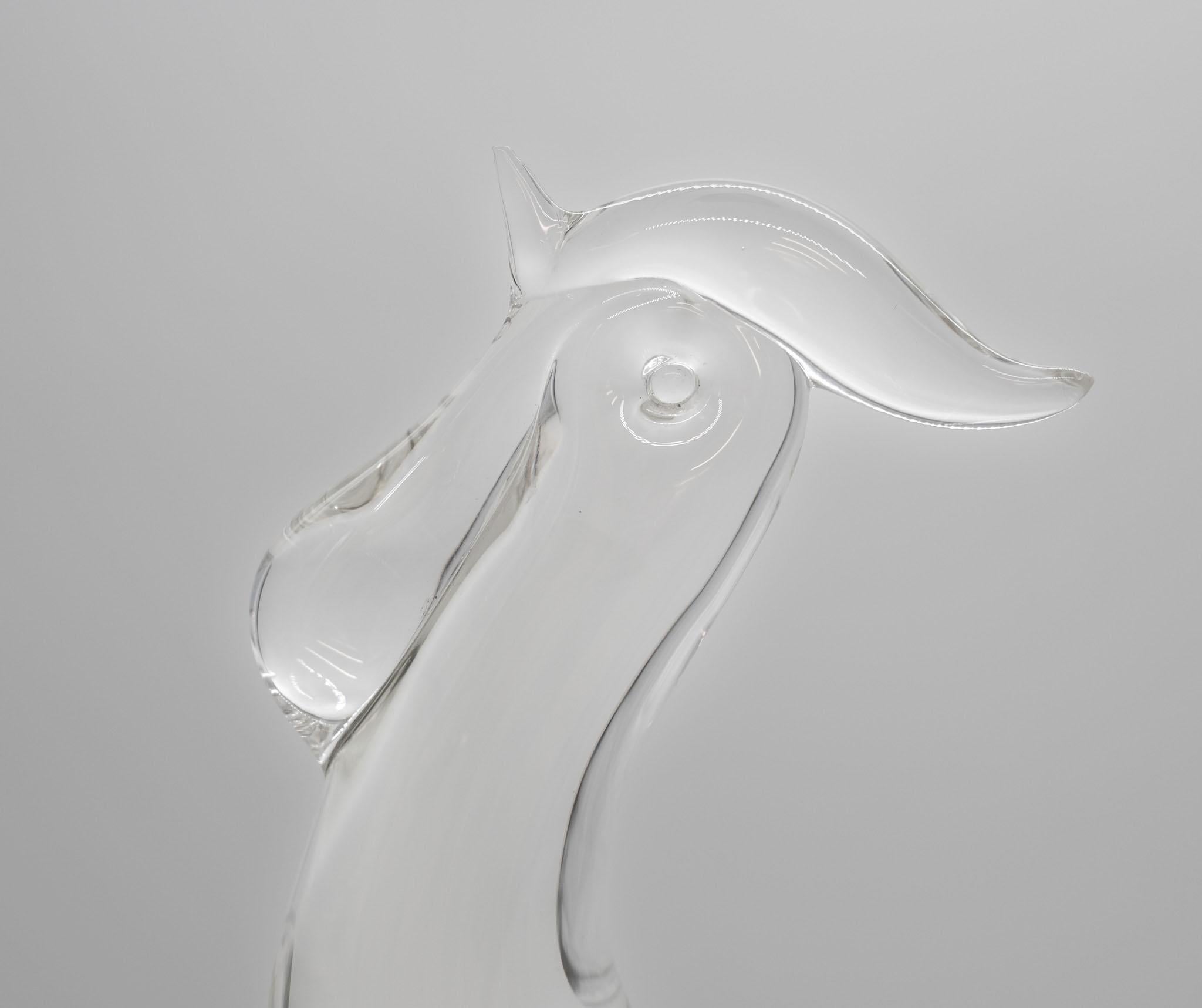 Murano clear glass hand sculptured cockerel by Licio Zanetti. Signed to base. Circa 1960-70.

Very good condition with no chips or cracks. One small mark to note, as shown.

The Zanetti Vetreria Artistica was founded in 1956 by glassmaster Oscar