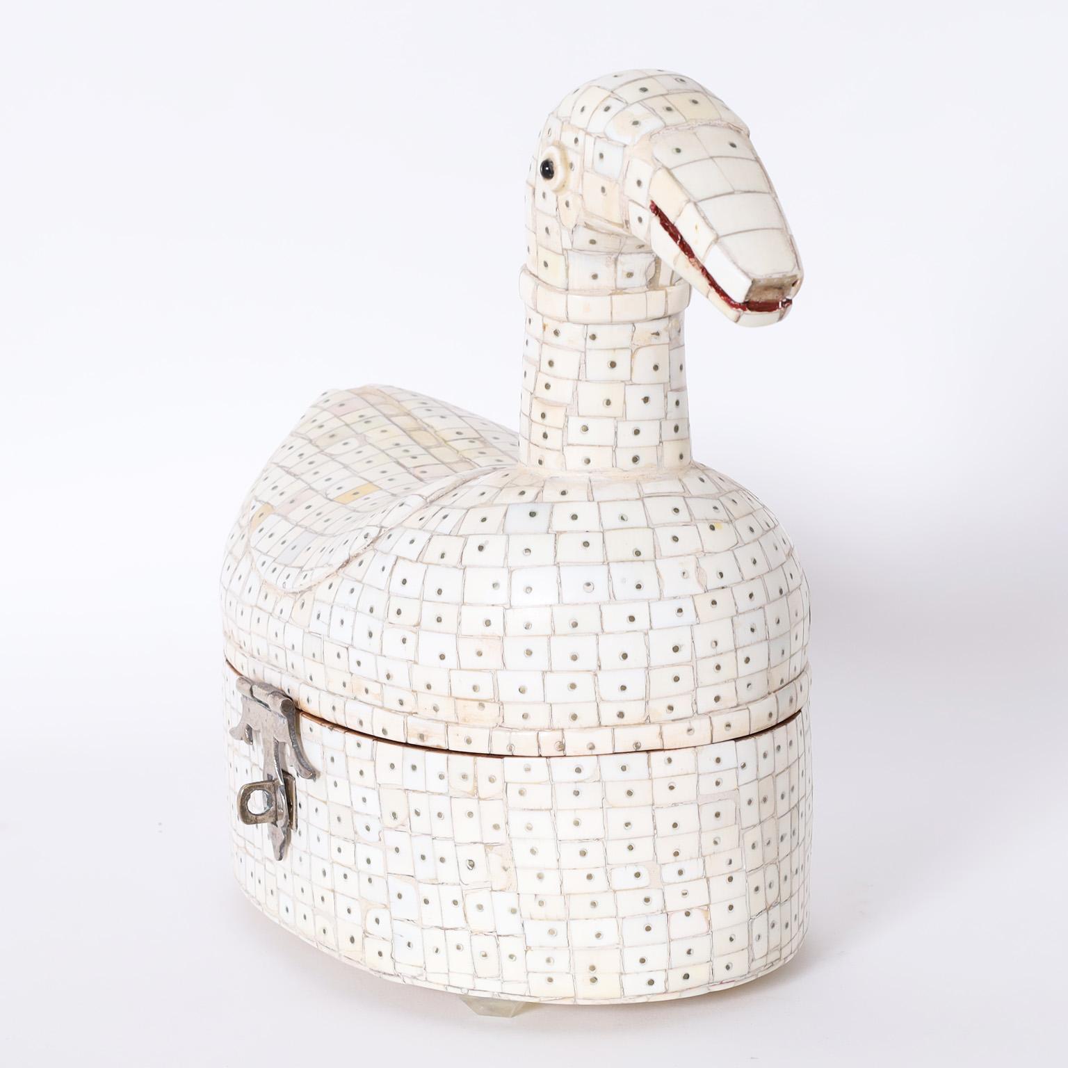 Delightful Anglo Indian lidded box crafted in a bone mosaic over a wood frame in a stylized whimsical duck form.